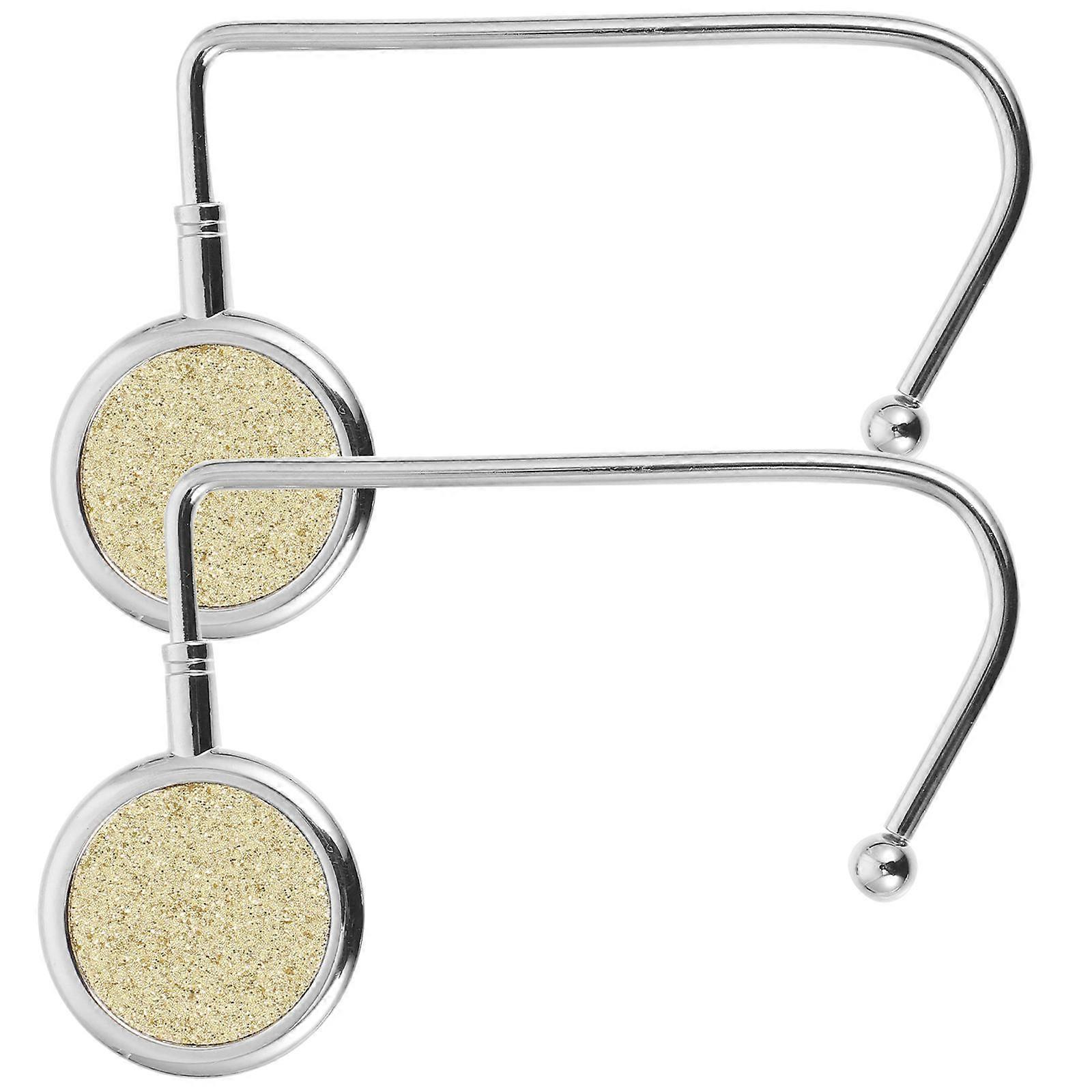 It seems like you're referencing a product listing for **alloy backpack hooks with a non slip base**, likely used as **portable handbag hangers**.