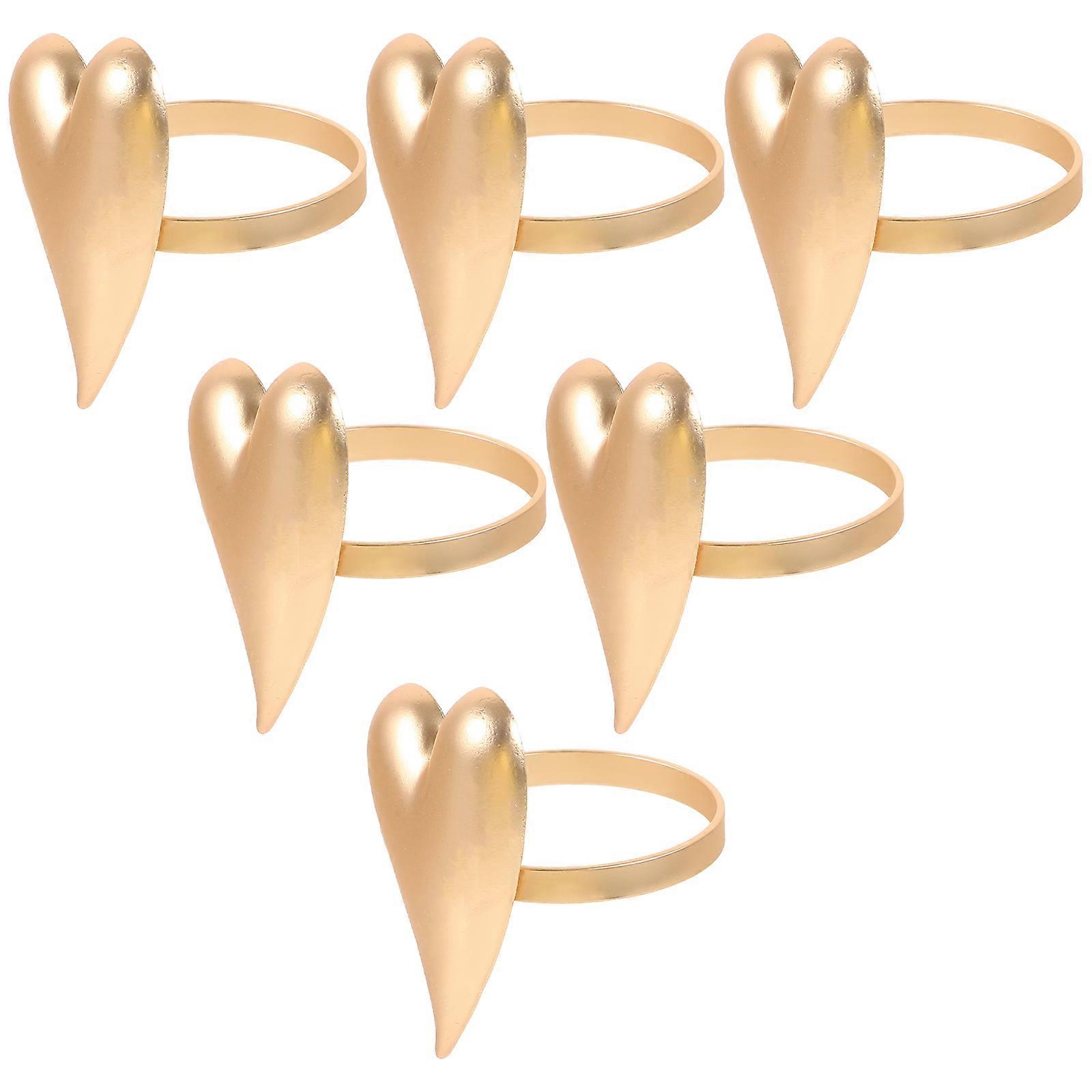 It seems like you've provided a product title or listing description for **Valentine Heart Napkin Rings**. If you're looking for assistance related