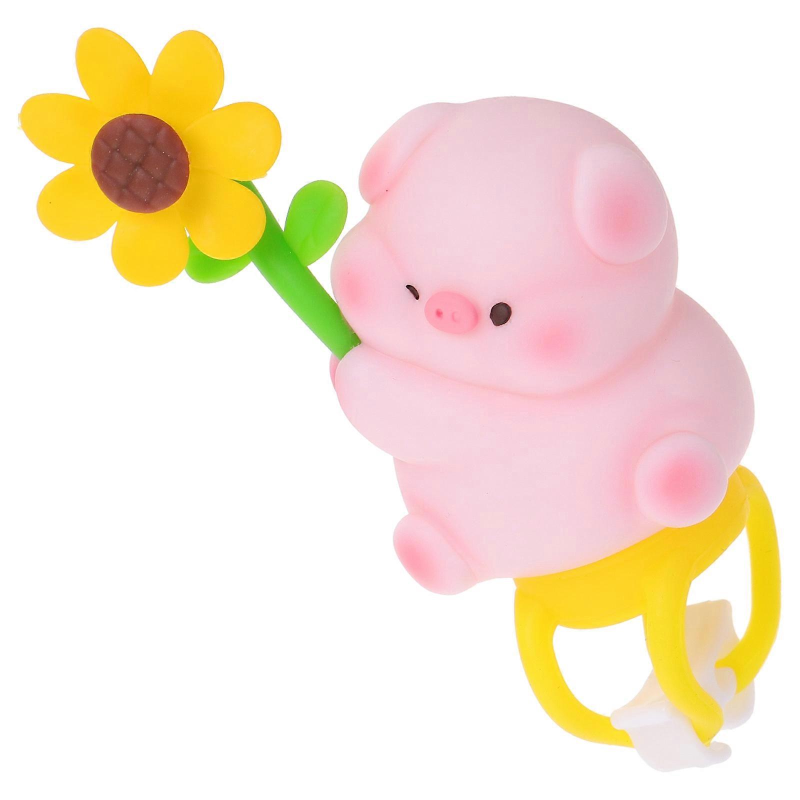 The **Funny Pig Motorcycle Handlebar Ornament** is a whimsical and eye catching accessory designed to add personality and charm to your motorcycle or