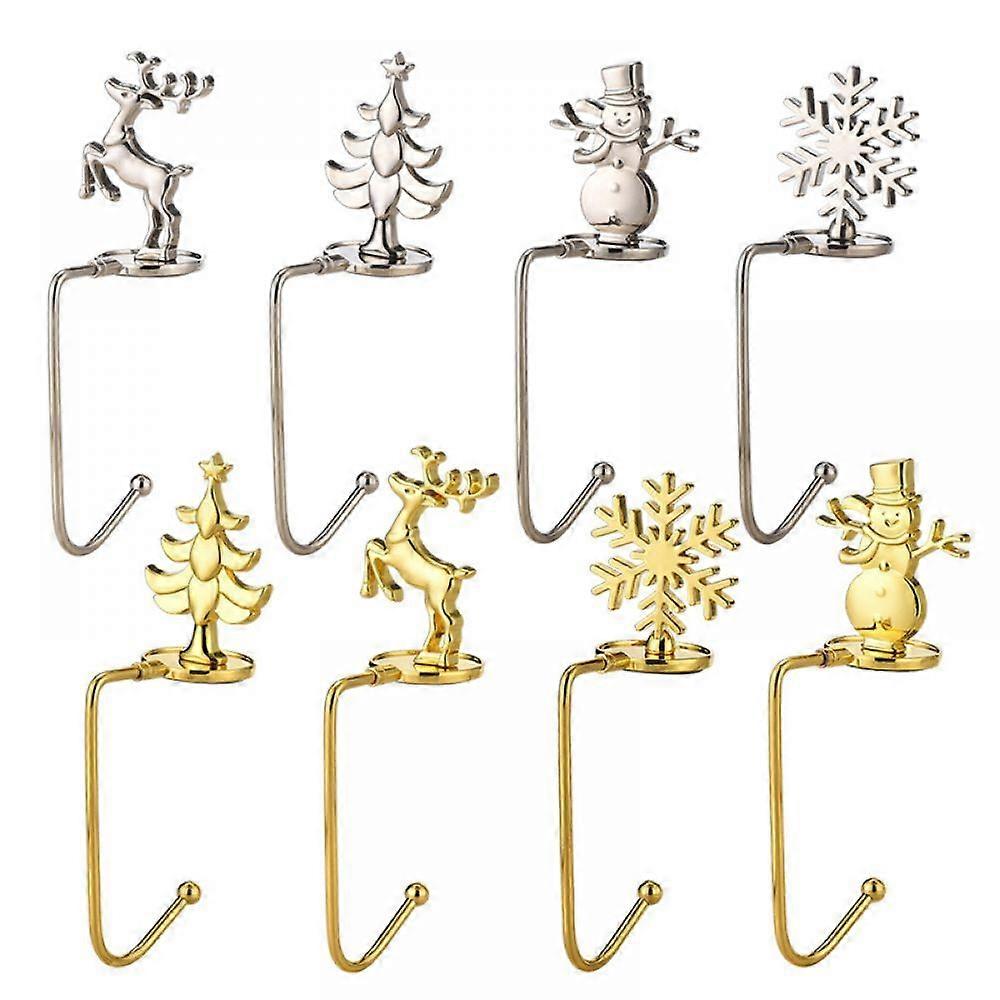 10pcs Christmas stocking stand, two each in silver (Christmas tree) and gold (snowflake), one each in the other styles