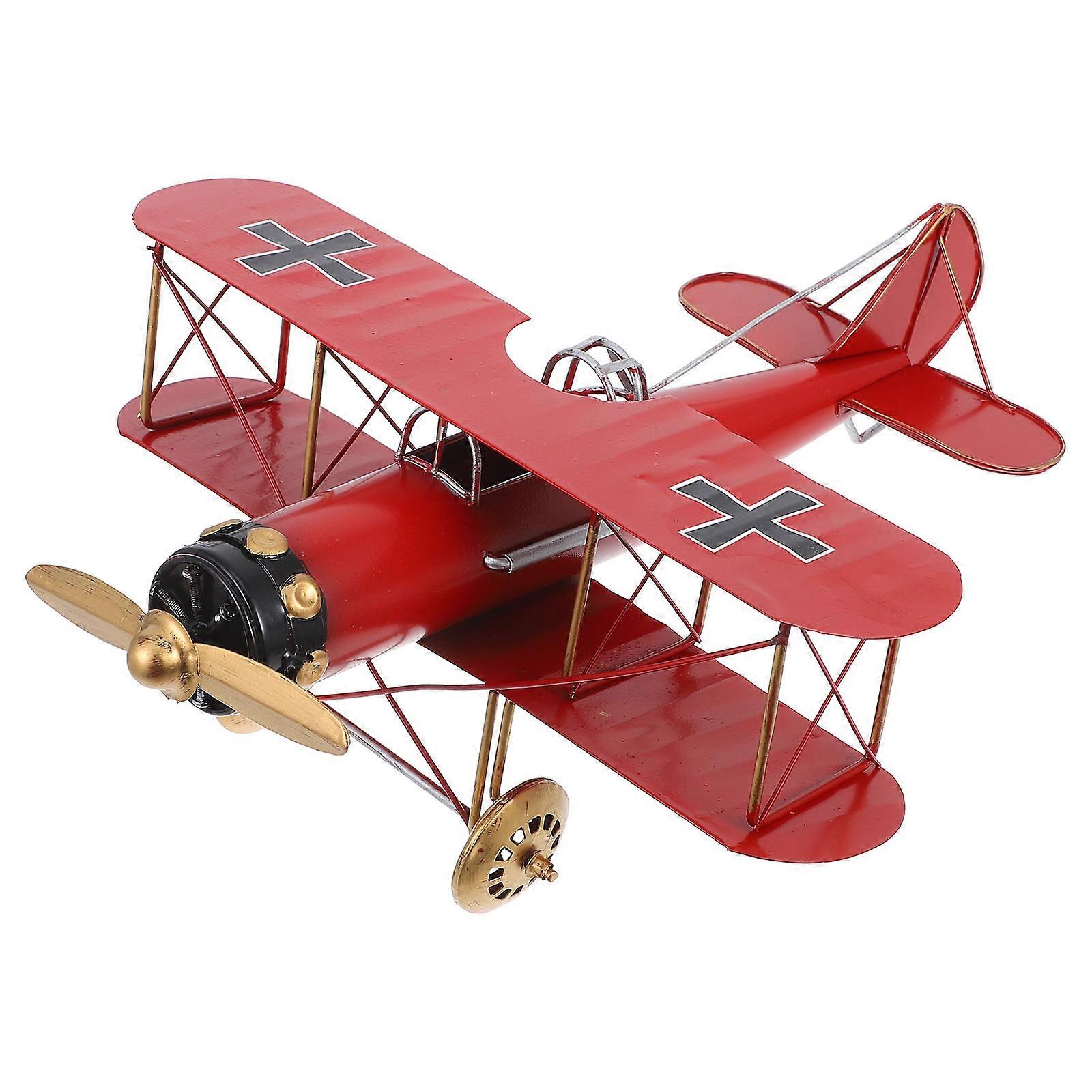 Here's a polished product description based on your input:

 

**Vintage Metal Airplane Model – Retro Biplane Decor with Intricate