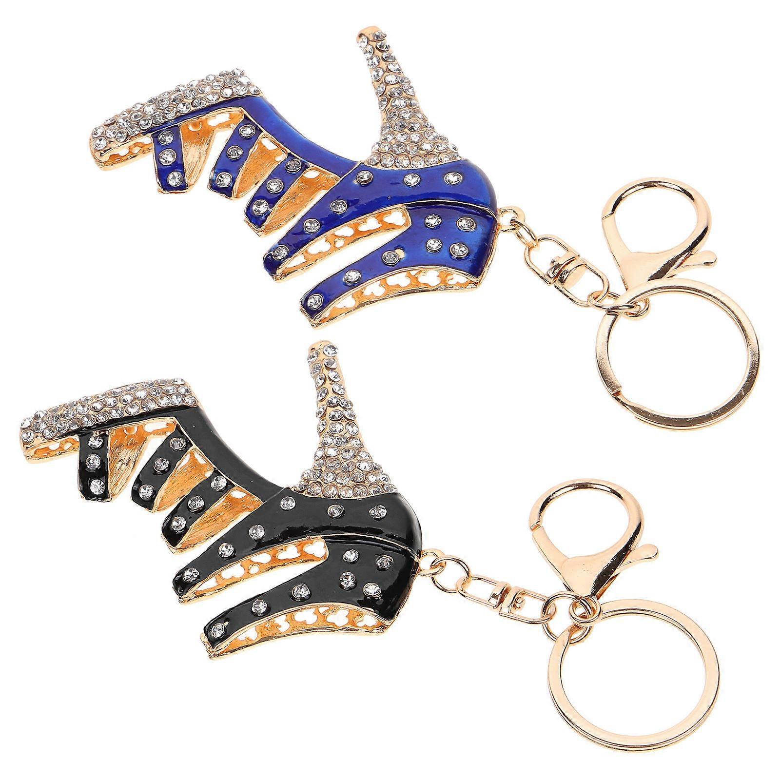 a refined and professional product description based on the title you provided:
**2pcs Rhinestone High Heel Keychain Handbag Charm, Decorative