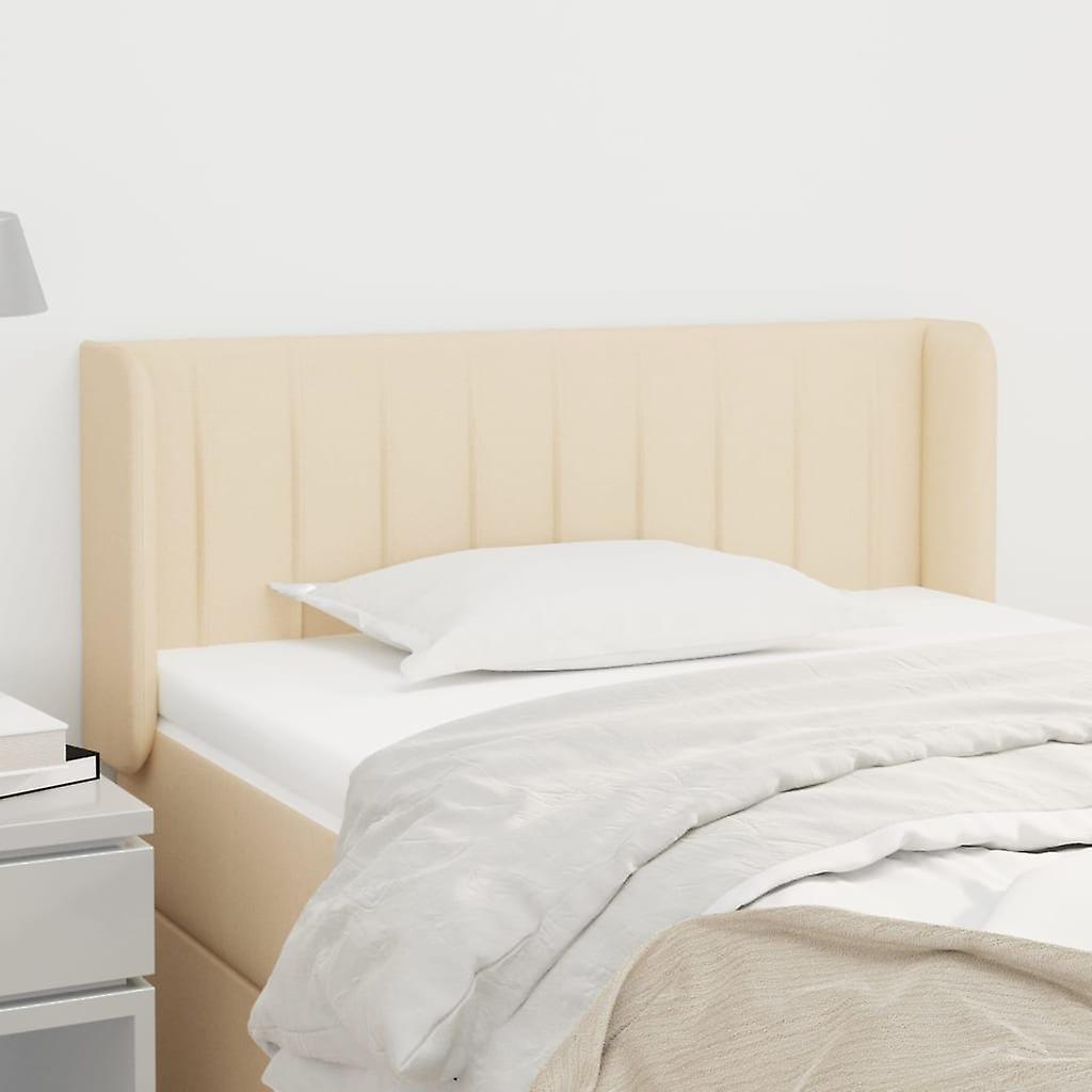 Čelo postele s ušima krémové 103x16x78/88 cm Látka