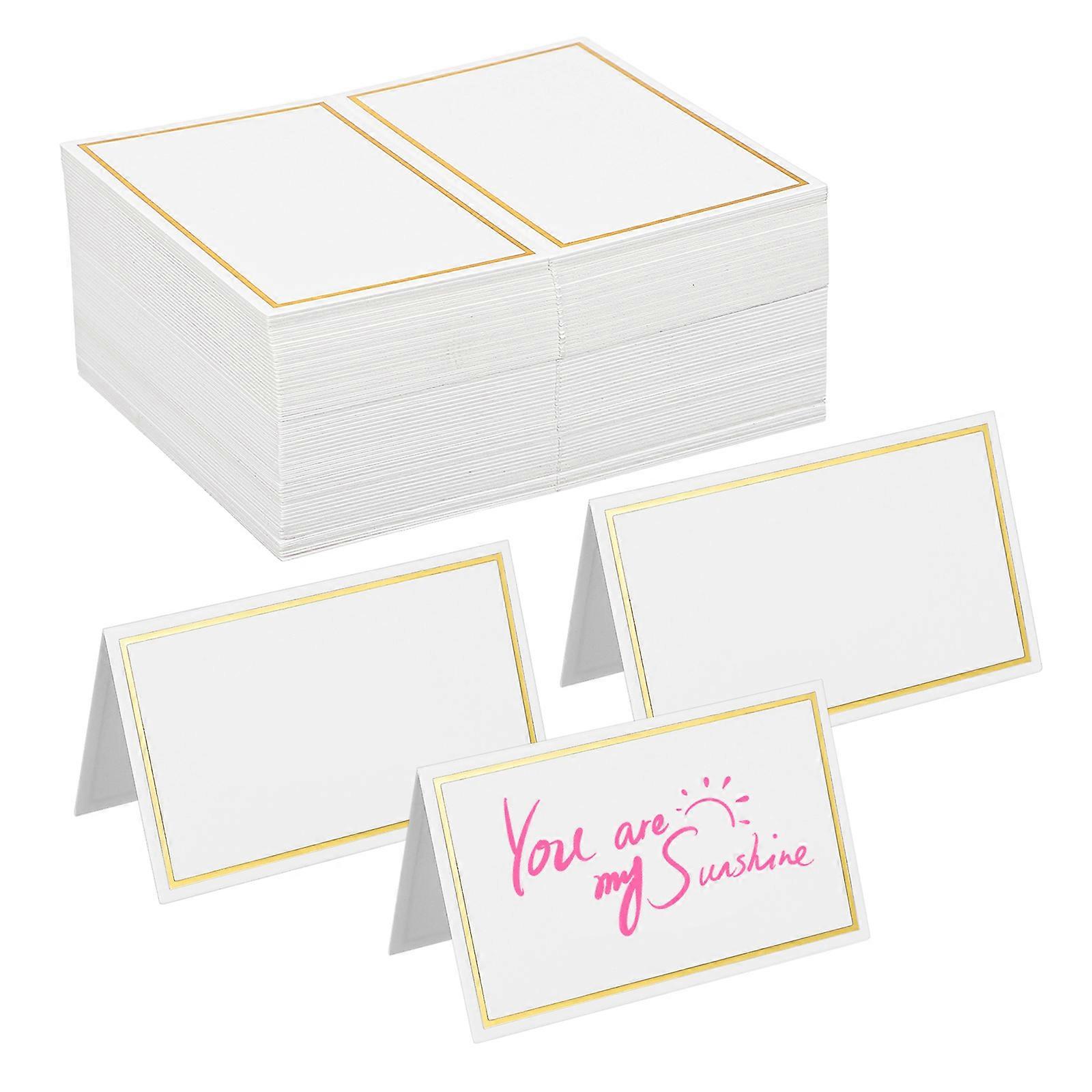 テーブル席カードは、結婚披露宴のためのエレガントな折りたたみデザイン120個を配置します