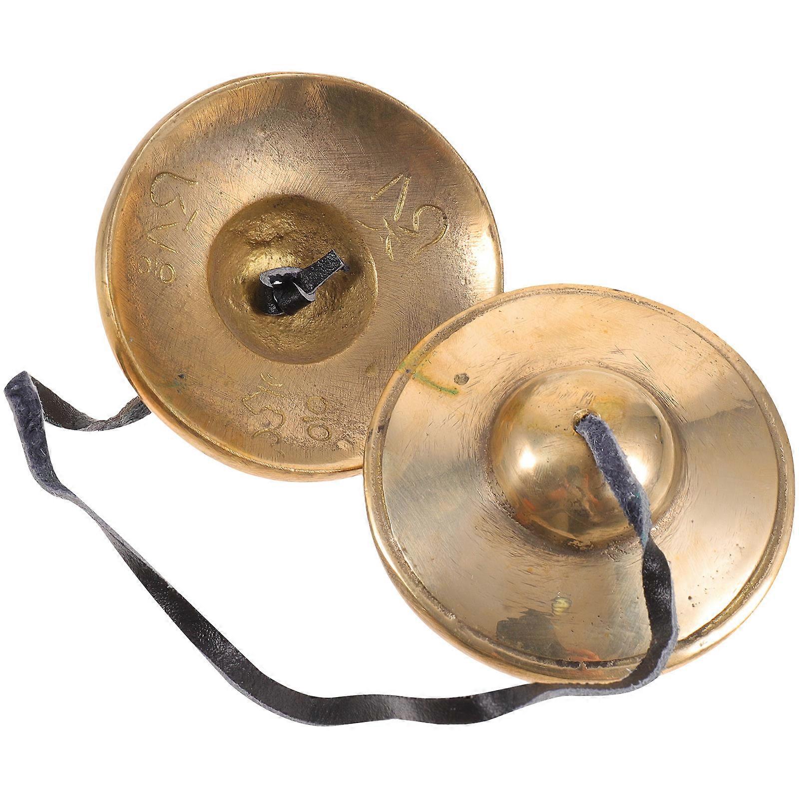 Tingsha cymbals are small, high pitched, hand held cymbals used in sound , meditation, and yoga practices. The description you provided refers to a