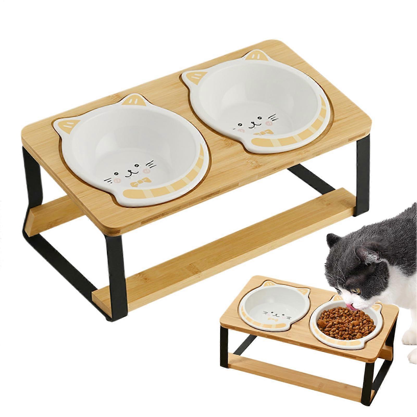 Elevated and wet cat food dishes – placed separately in a quality ceramic bowl to save space.