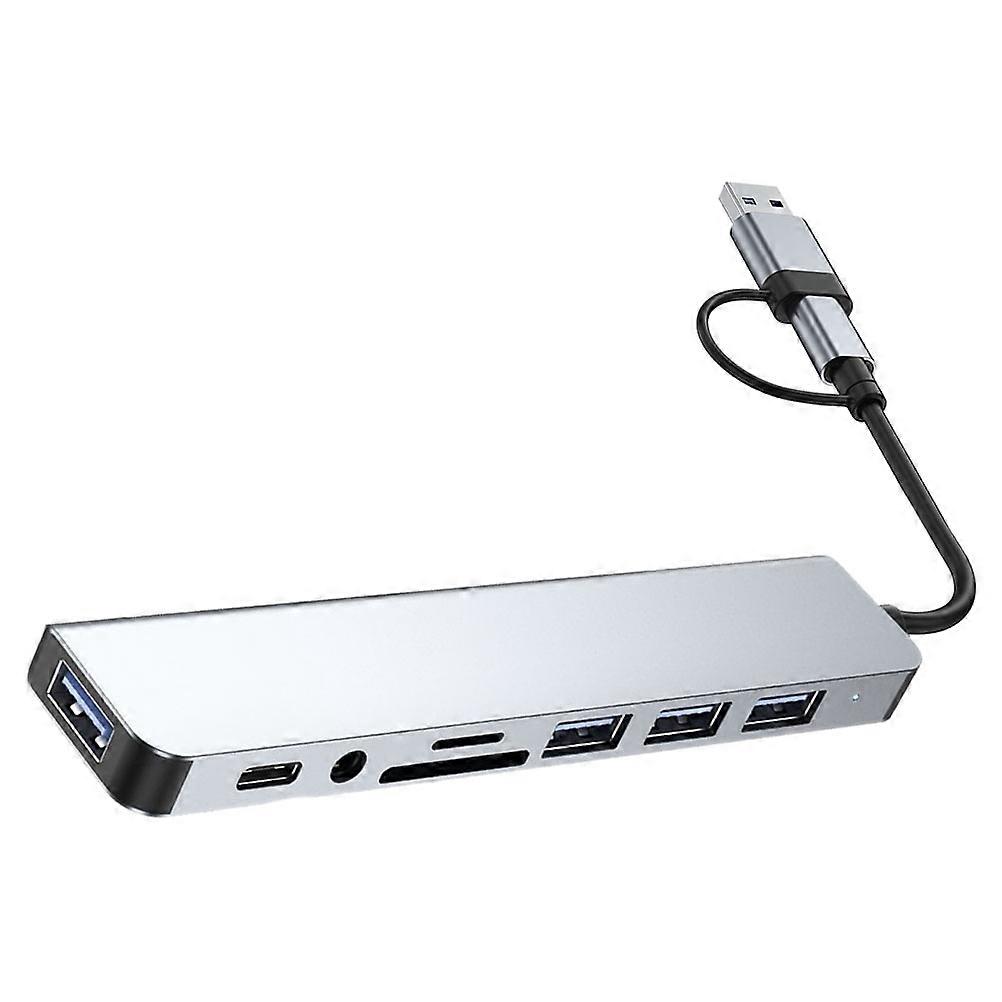 Here's a well structured product description for a **USB Hub Adapter with Multiple Ports and Audio Jack**, designed for compact and convenient laptop