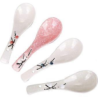 A set of 4 Chinese/Japanese ceramic spoons with pink cherry blossoms and snowflakes