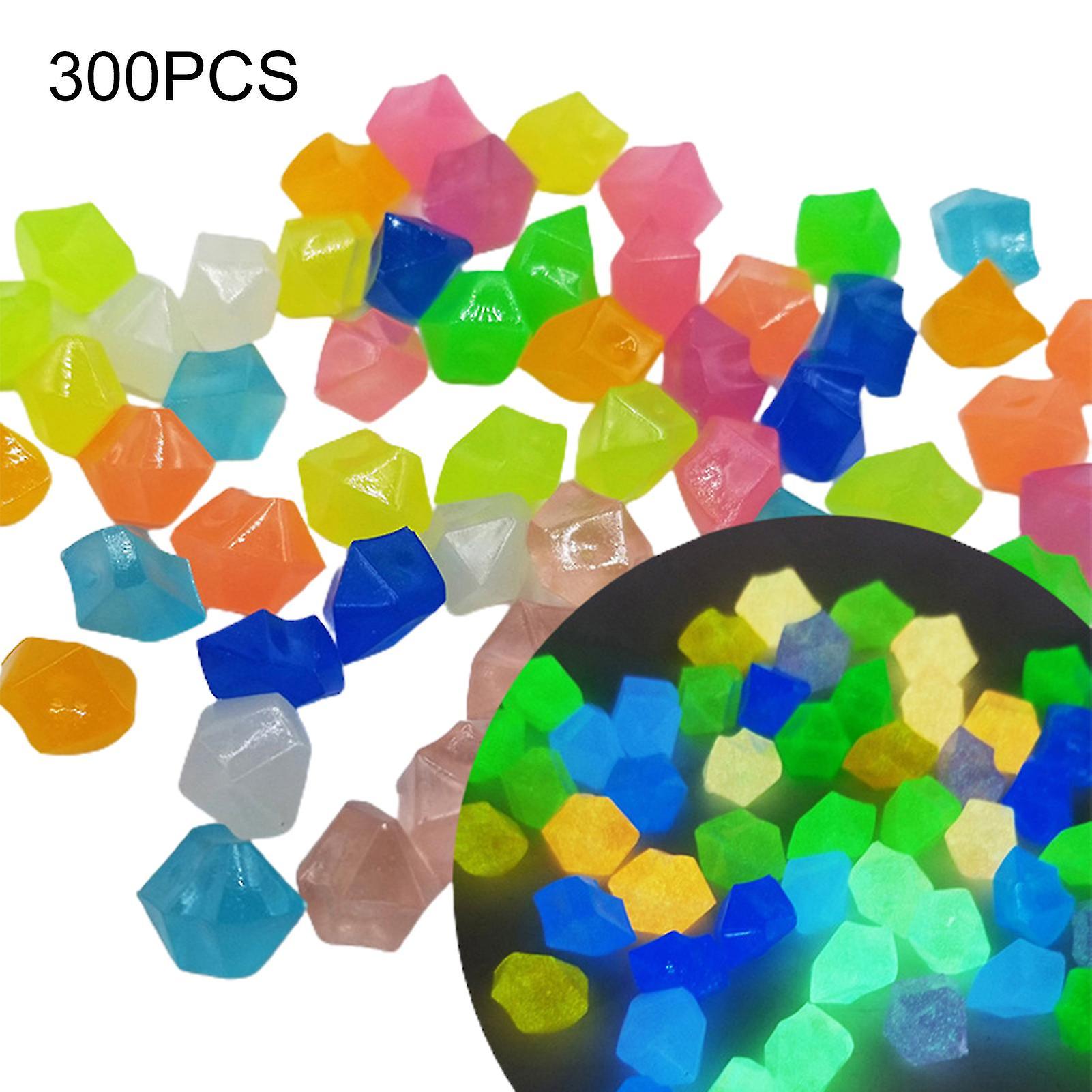 300pcsダークアクアリウム小石非放射性日光は、装飾的な歩道ガーデンパスパティオ草地のための発光石を吸収します