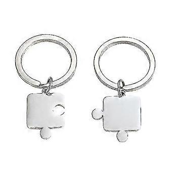A pair of stainless steel couple keychains, creative puzzle-shaped key rings, intimate pendant keychain craft decorations.