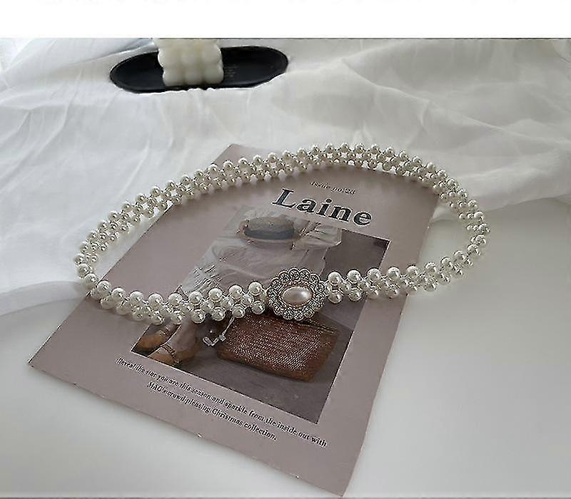 Rugalmas öv derékra gyöngyökkel és stílusos ékszerekkel