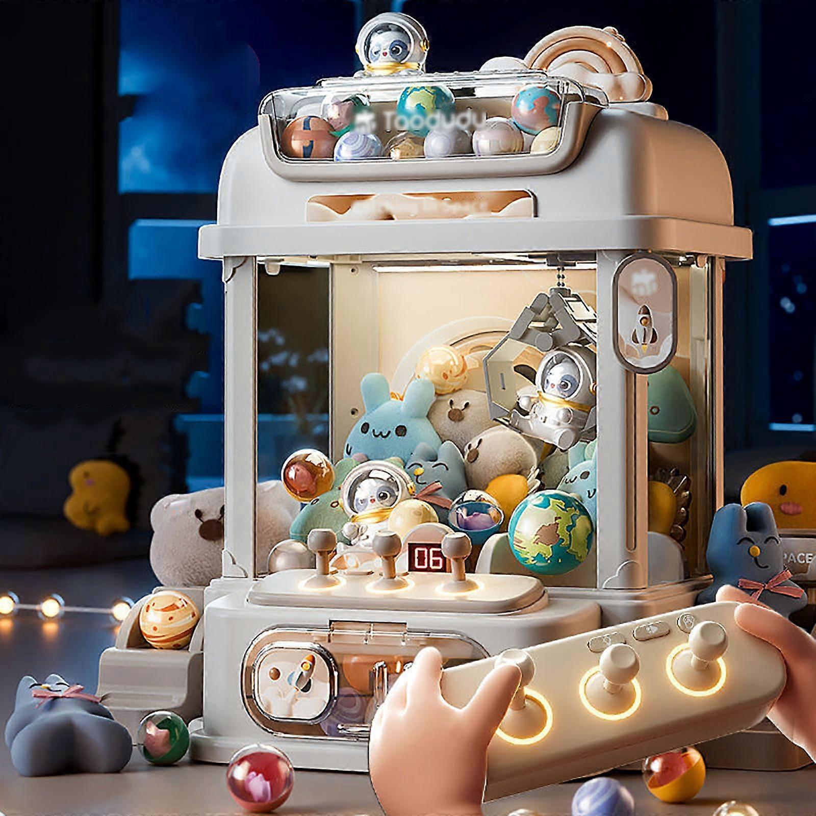Candy vending machine with remote control, claw machine candy with 8 planets, 2 panda plushies, 25 dolls, 20 gashapons for party, birthday, white.