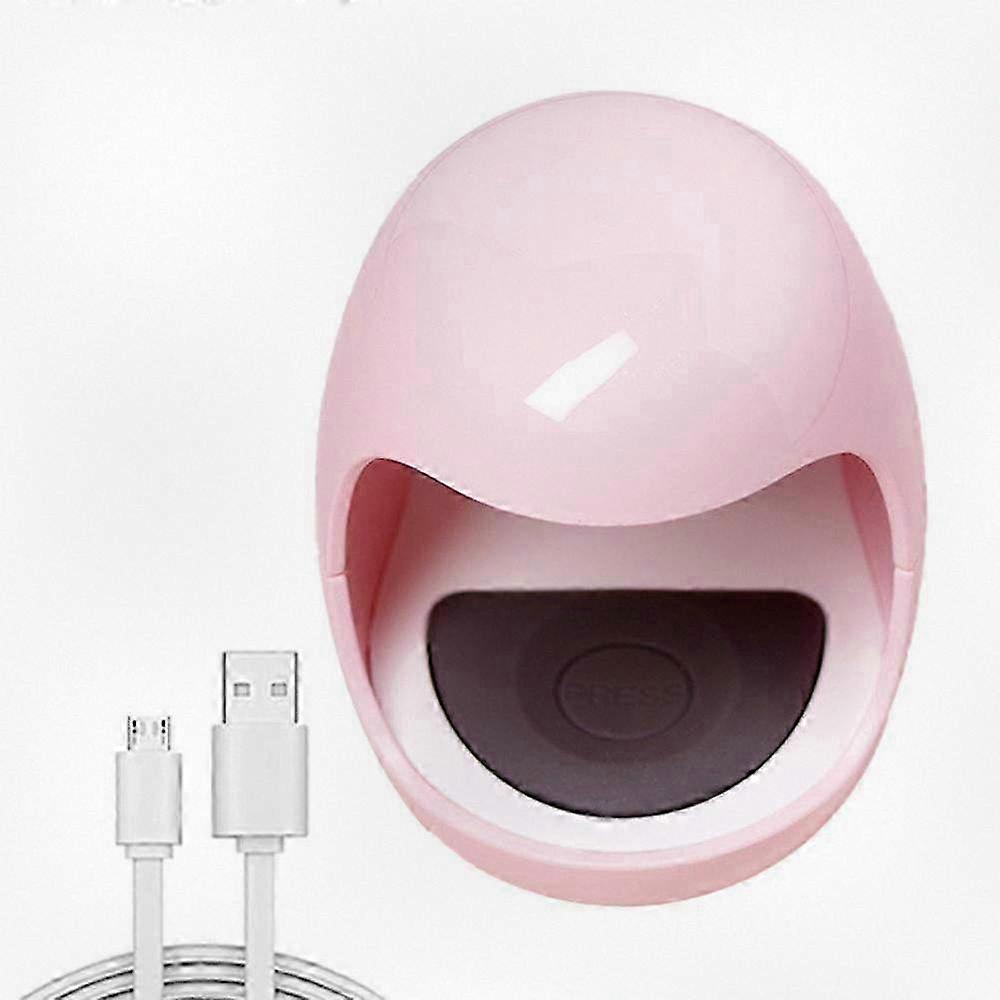 Portable and compact manicure lamp in pink - egg-shaped design (includes data cable) for makeup applications