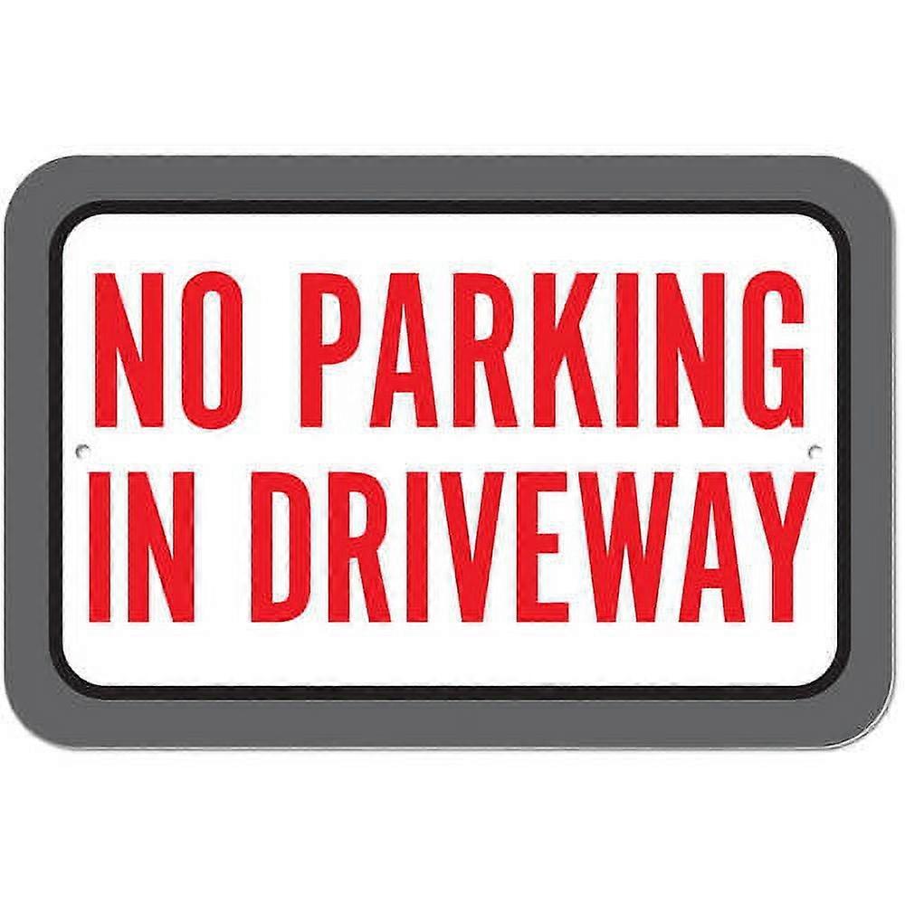 Señal de no estacionar en la entrada