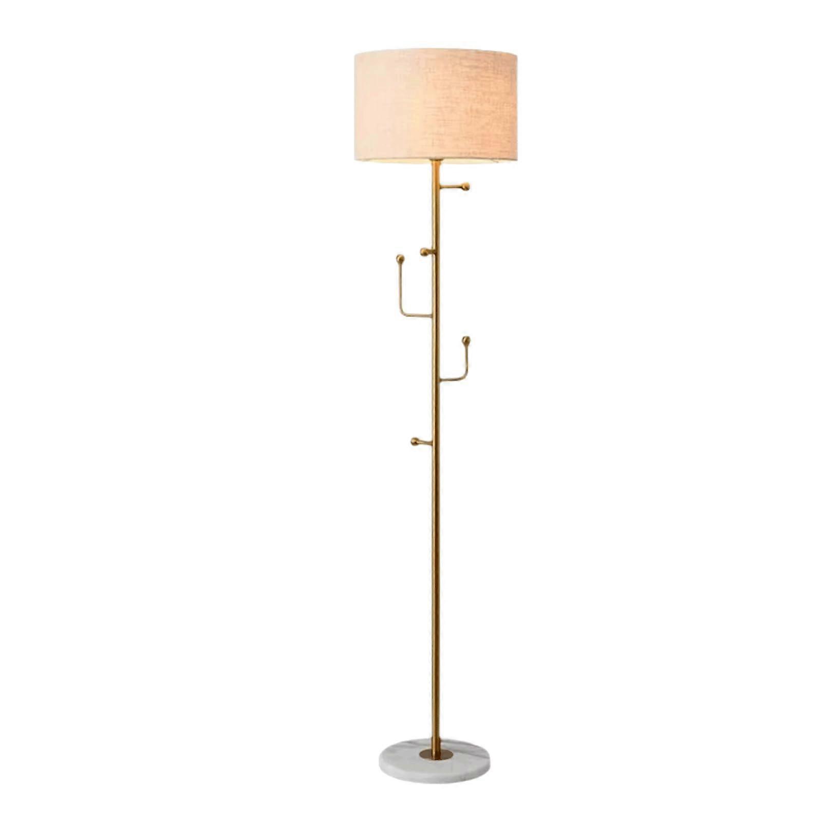 Stylish metal floor lamp for bedroom with hook stand, fabric shade, corner lamp, marble base, sturdy lamp in golden brown.