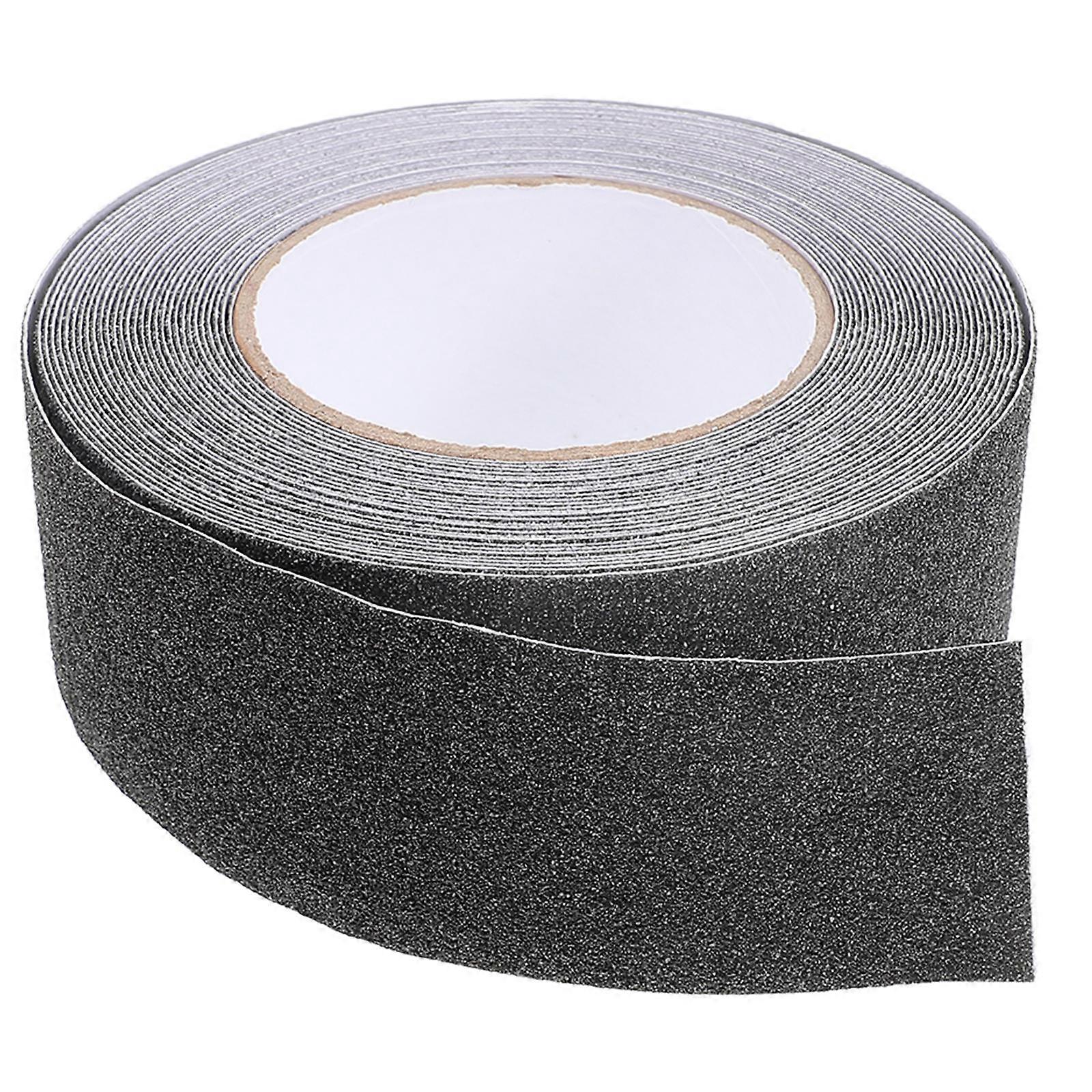 It sounds like you're referring to **miniature roadway tape** — specifically a **realistic black adhesive car track tape** used for creating **model