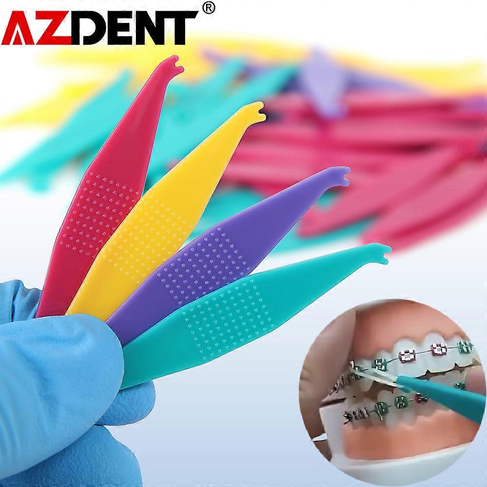 HaKeLai 50PCS / PACK Dental Orthodontic Élastique Élastique Élastique Élastique Placers Couleur Aléatoire