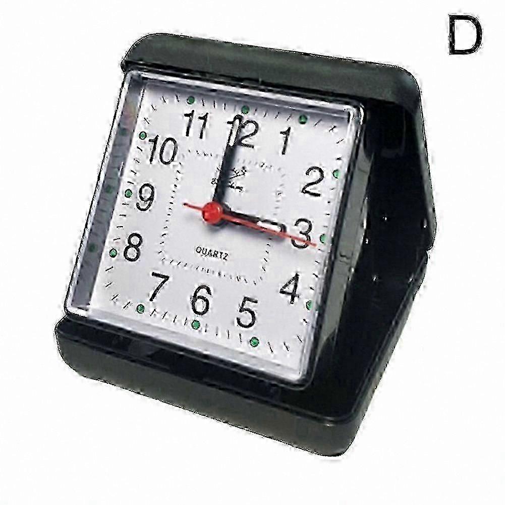Compact digital alarm clock with snooze function, silent operation, suitable for bedside table or travel use, battery powered.