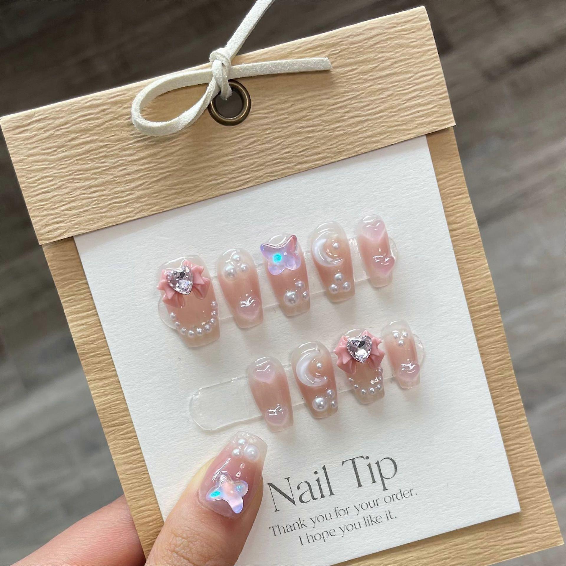 10Pcs handgemachte Nägel Set Press on Long Mandel Falscher Nagel mit Strass Rosa Kamelie Design Wiederverwendbare Vollabdeckung Gefälschte Nagelspitzen