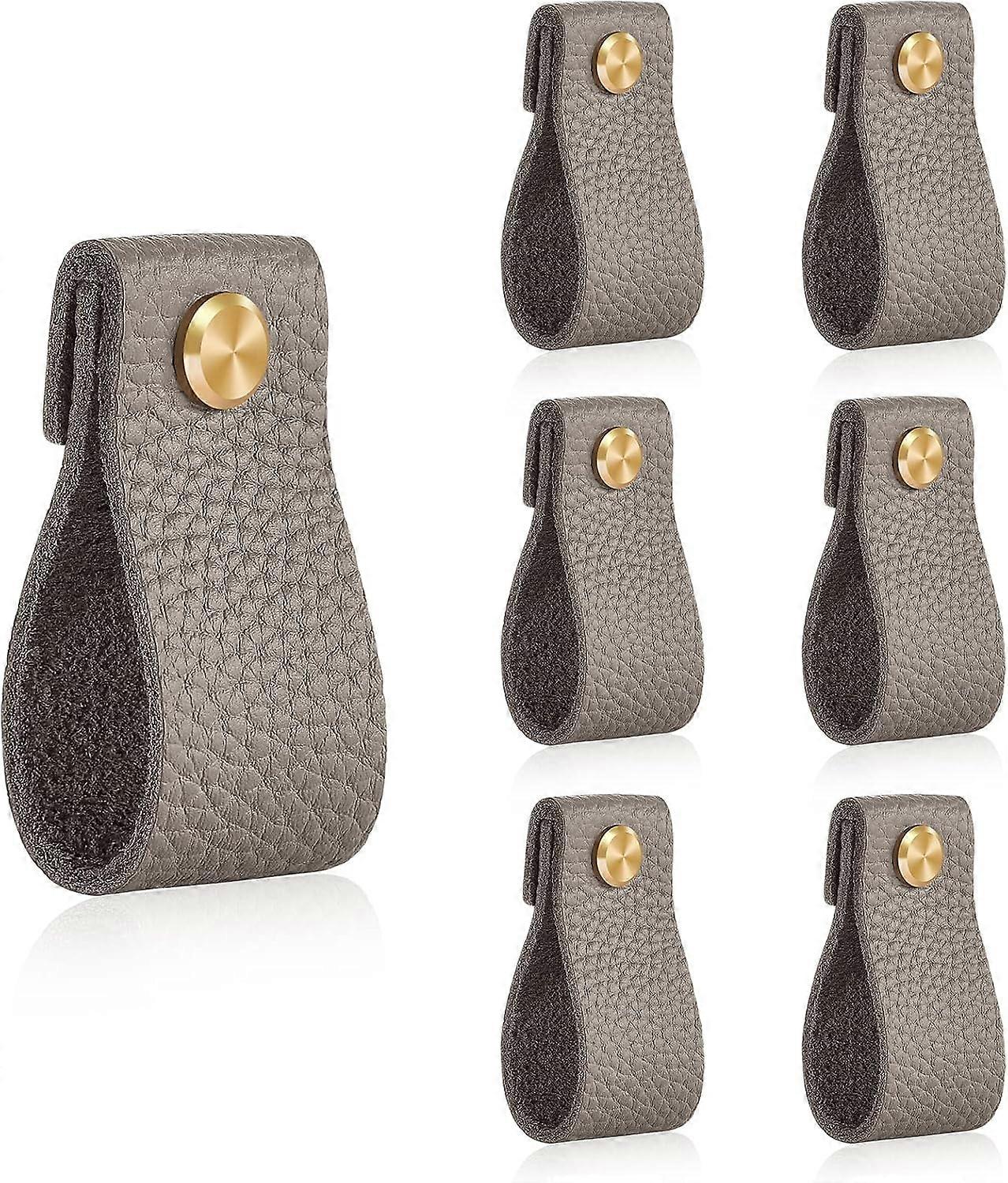 Leather drawer handles, brass material, for dressing tables.