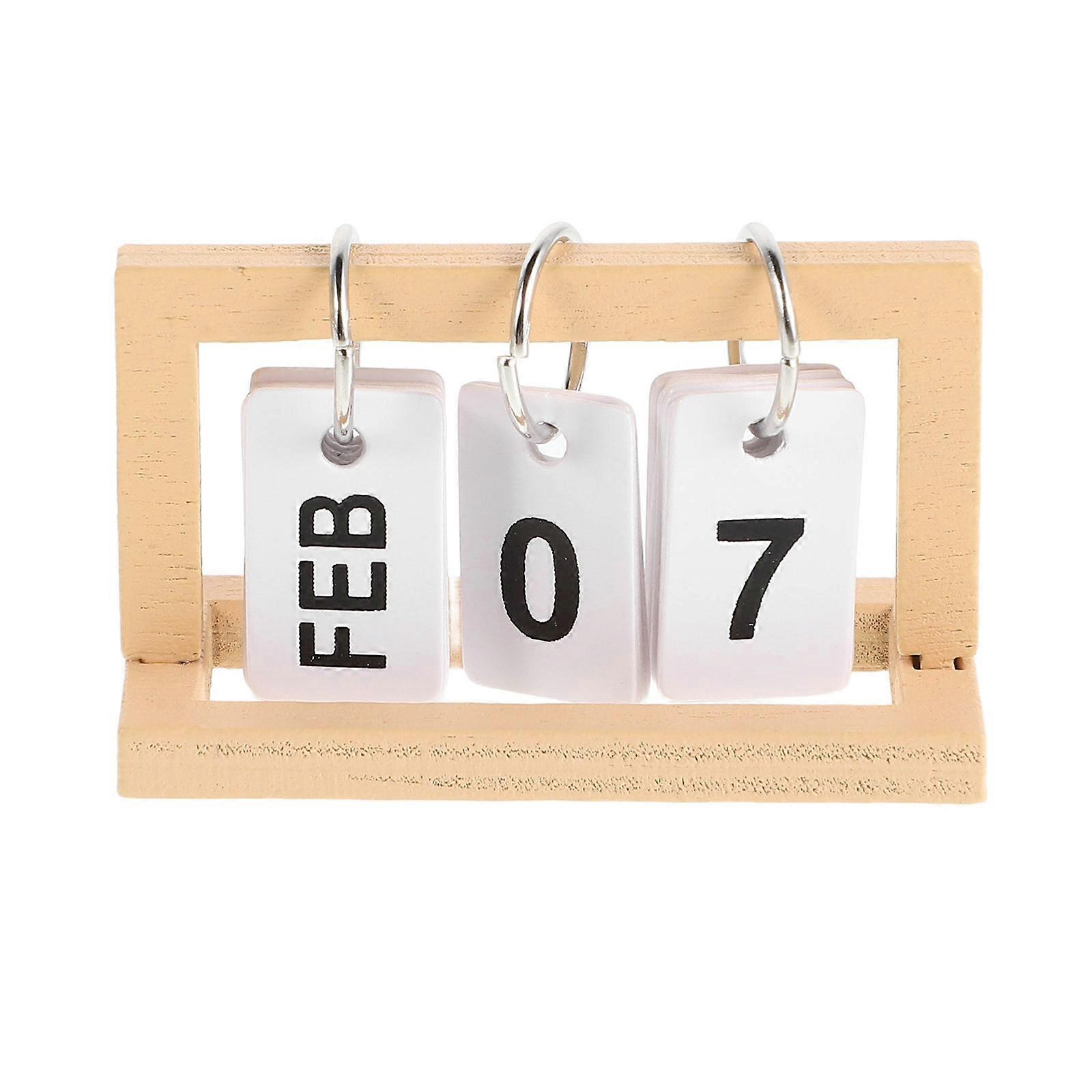 The **Miniature Wooden Flip Calendar For Dollhouse Pretend Play** is a charming and functional decorative item that serves both as a playful