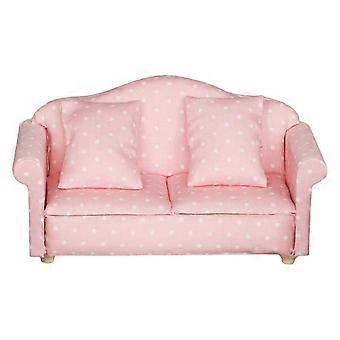 Pink minisofa med polkaprikker til dukkehusleg