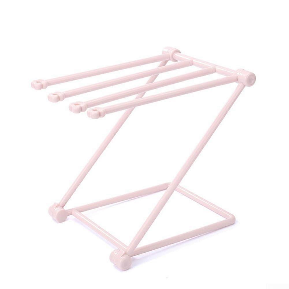 Compact drip rack for washcloths, stylish storage solution for towels and bottles. The clock is part of the product.
