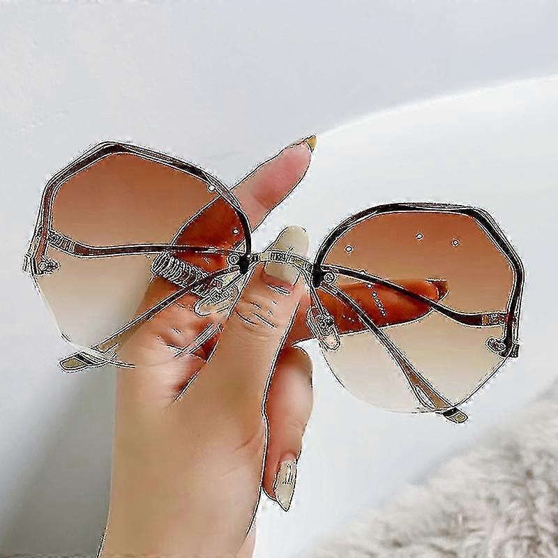 ラグジュアリーラウンドグラデーションサングラス女性メタルカーブテンプルレディースUV400アイウェアオーシャンリムレスサングラスUV400オキュロスデソル