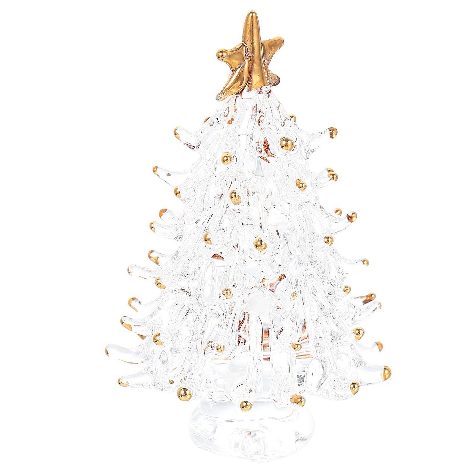 a polished product description based on your input:

 

**Mini Christmas Tree Figurine – Festive Transparent Crystal Decor for Holiday Table