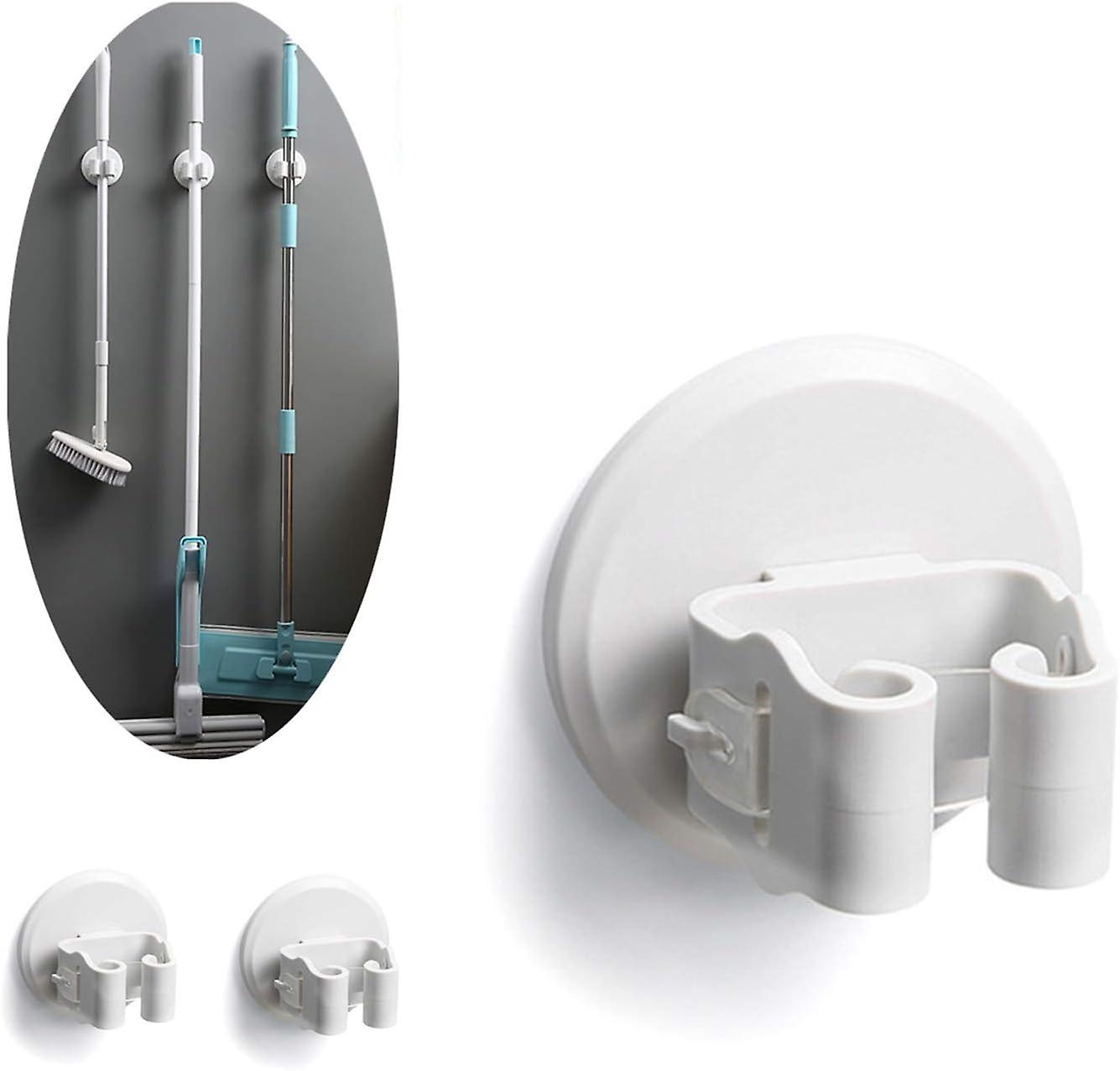 Multi-functional wall-mounted broom holder, self-adhesive mop holder