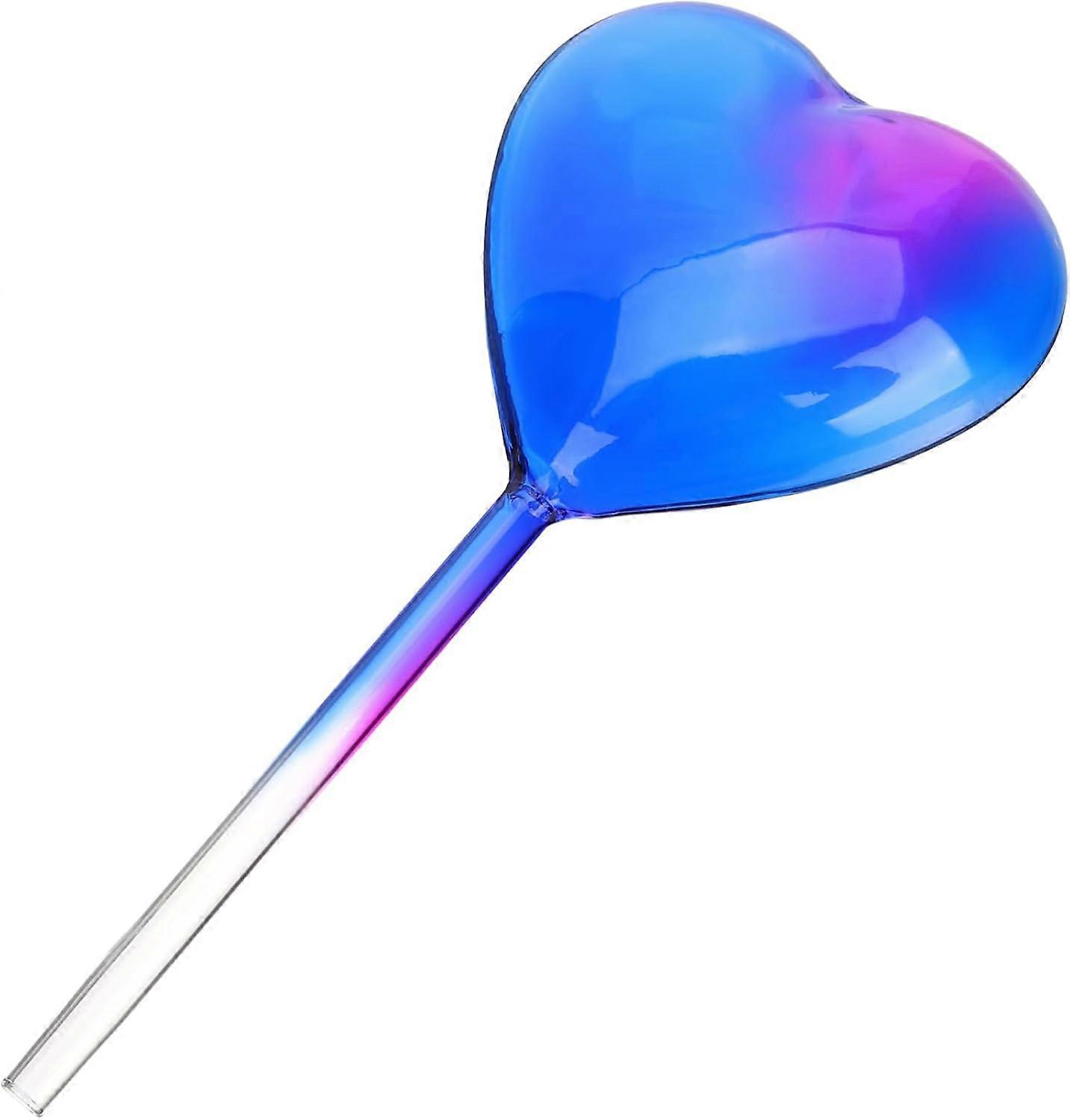 Easy-to-insert automatic watering device in glass, globe shape, keeps