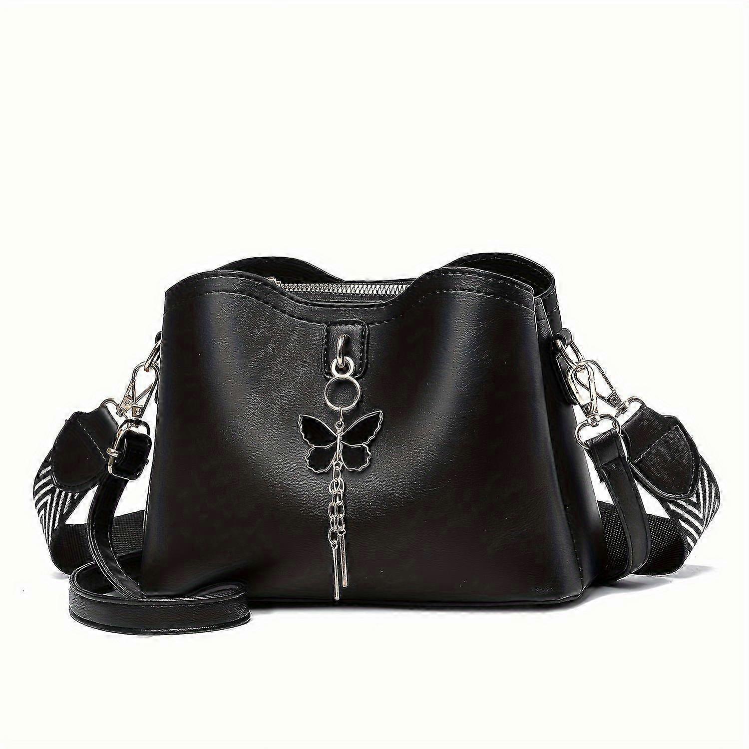 Bolso negro de moda con un original lazo de mariposa - Icono de estilo 2025