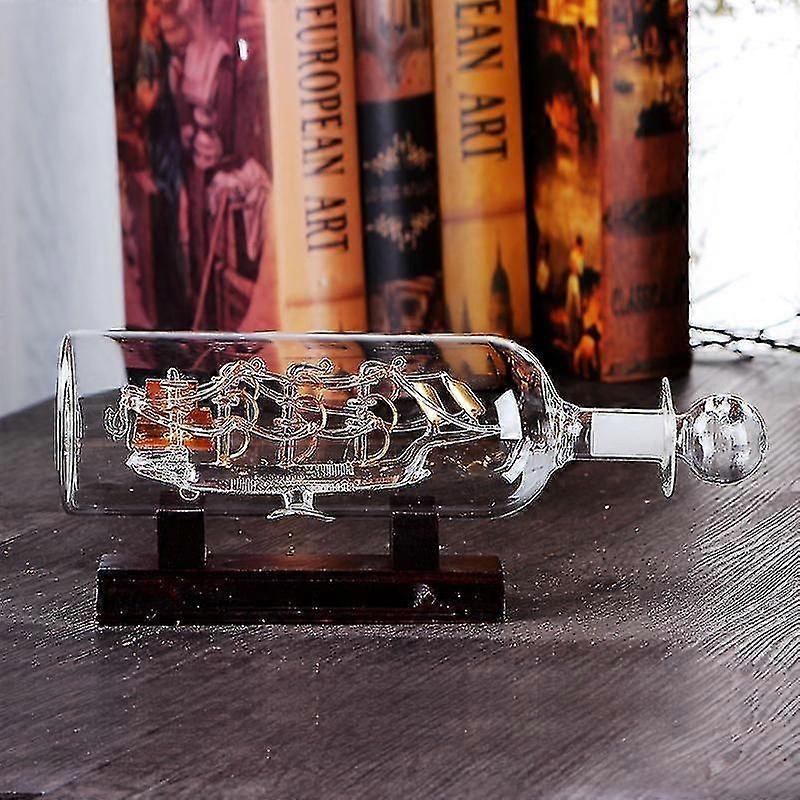 Barco à vela decorativo em garrafa de vidro, 24 x 10,2 cm, com base de madeira.