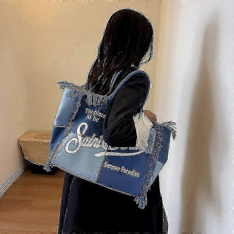 Shanghai Yangxin Fourre-tout de plage spacieux avec des pompons faits à la main sac en jean élégant