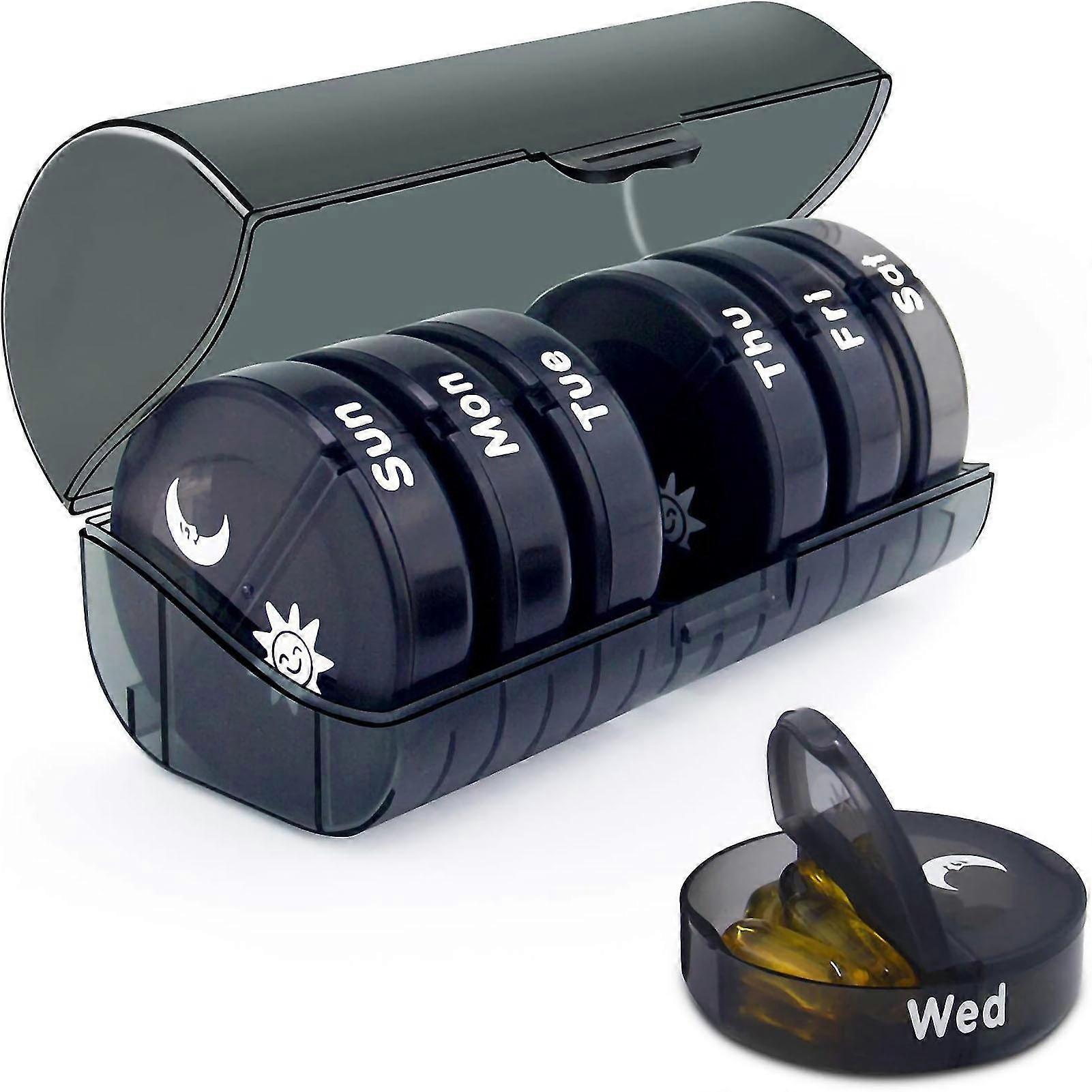 Round mini waterproof 14-compartment pill case black.