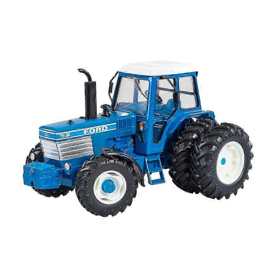 Blauer Ford Traktor TW-35 mit Kabine und Doppelhinterrädern