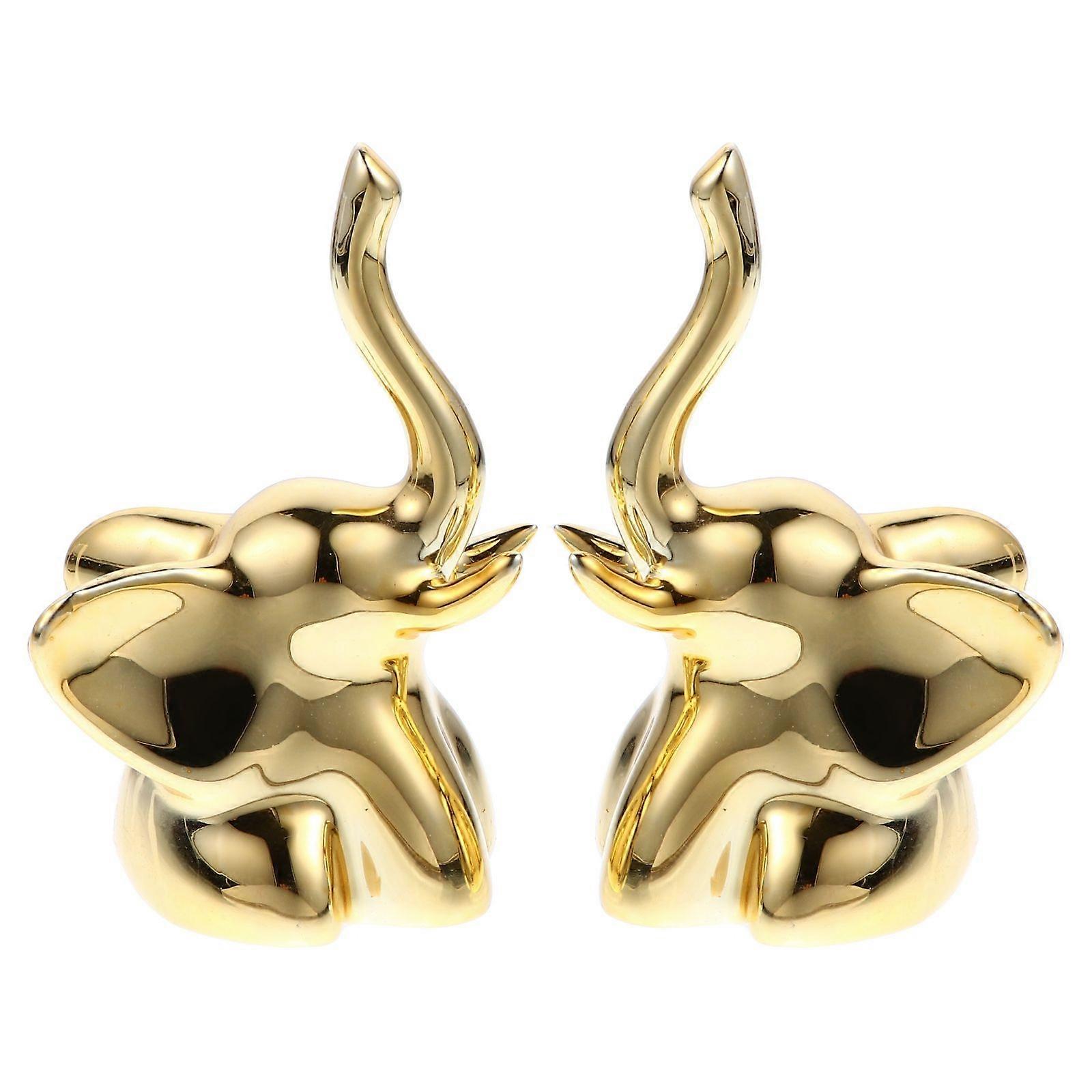 Here's a refined and professional product description for your **1 Set Elephant Ring Holder Gold Plated Jewelry Dish**:
**Elephant Ring Holder –