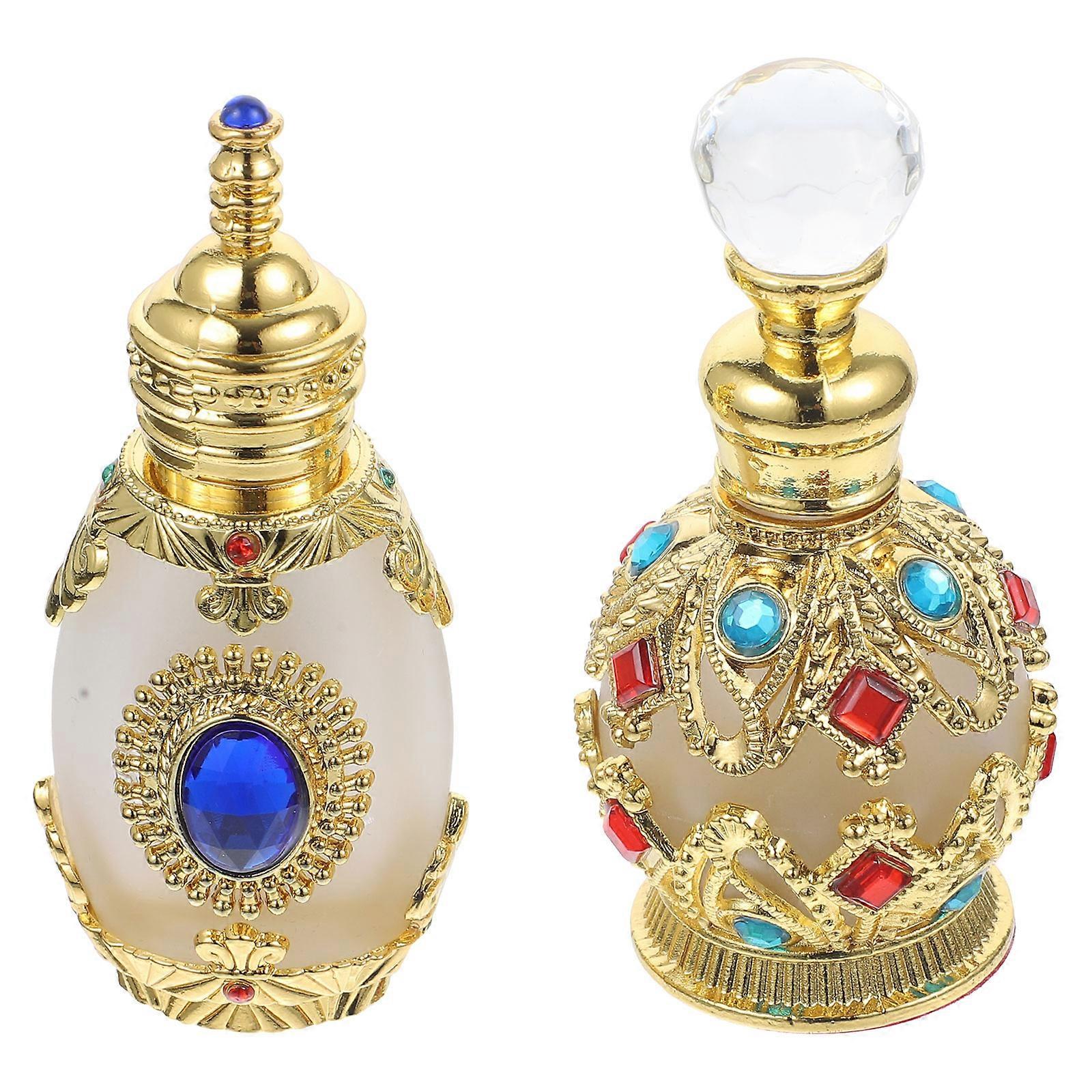 Here's a polished and professional product description for your item:
**2pcs Vintage Crystal Glass Essential Oil & Perfume Bottles – Refillable