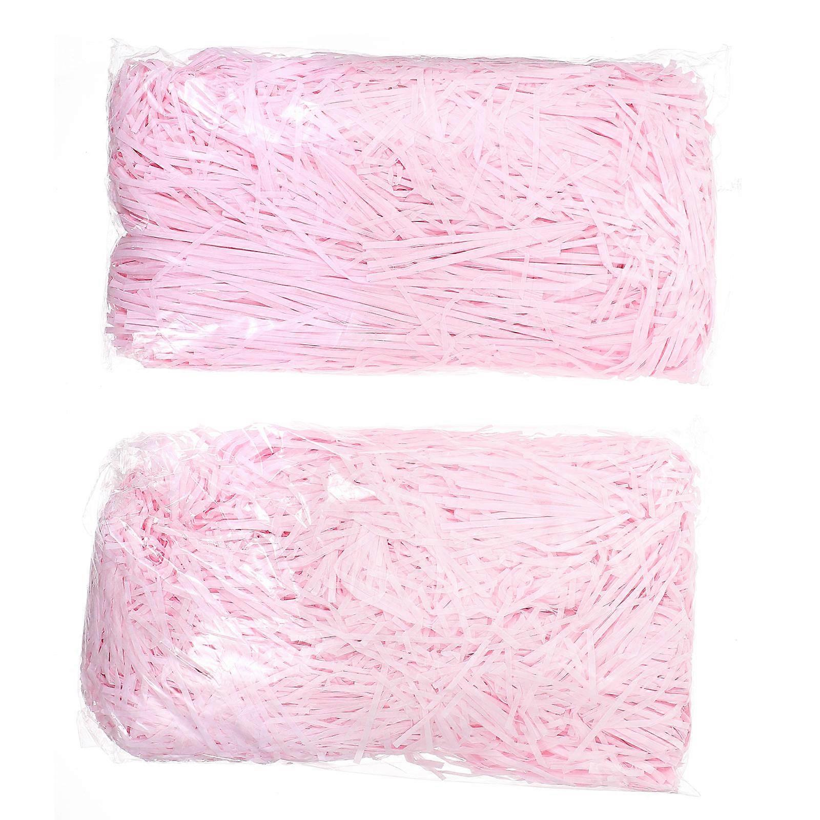 Creating your own **DIY shredded paper filling material** is a fun, , and cost effective way to add a decorative touch to **present boxes**,