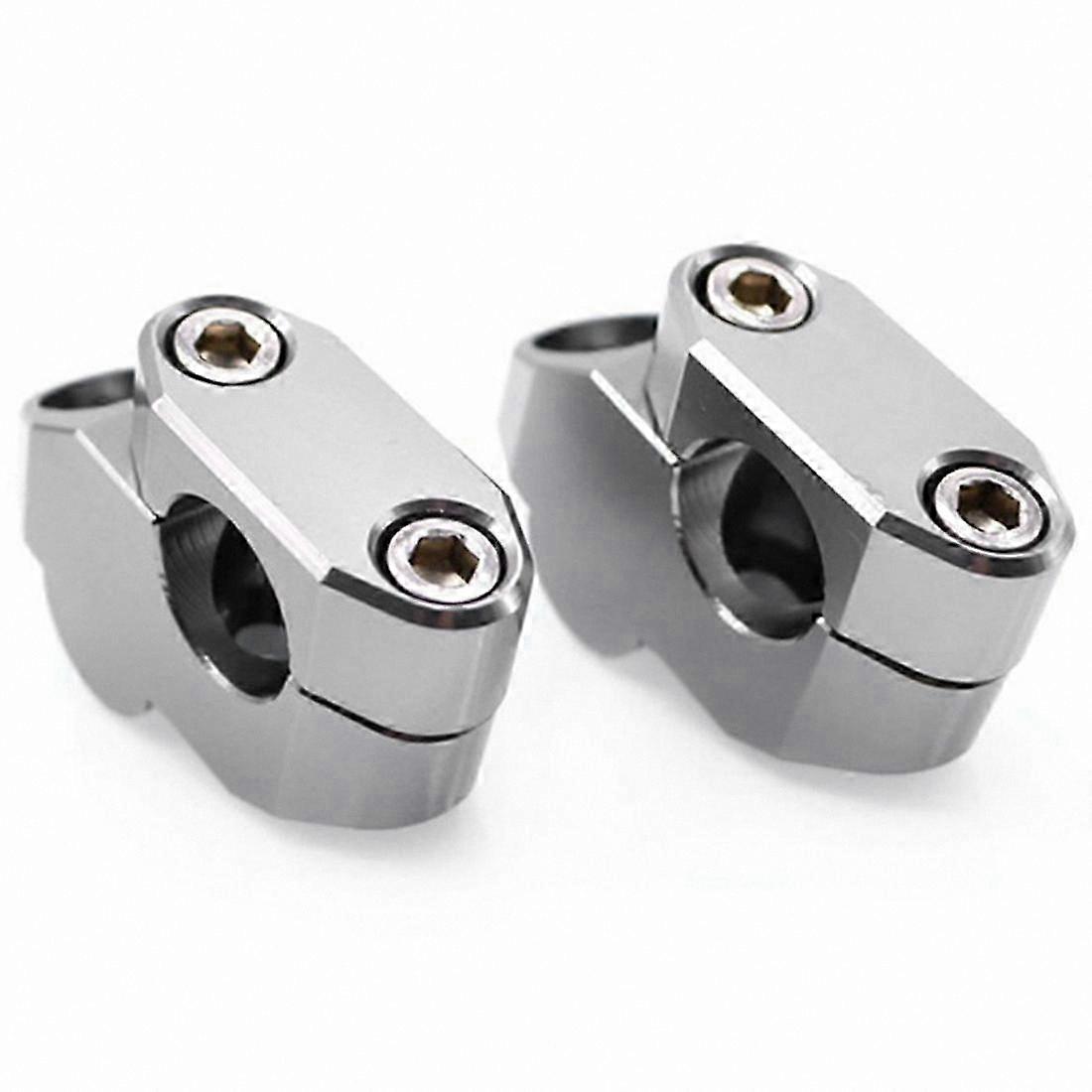 Silver Handlebar Risers for Enhanced Comfort and Control on Select Motorcycles
