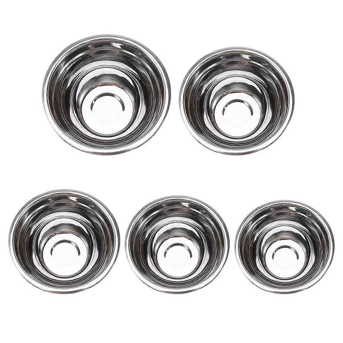 It sounds like you're describing a **deep stainless steel mixing bowl** commonly used in kitchens for various tasks like preparing fruit salads,