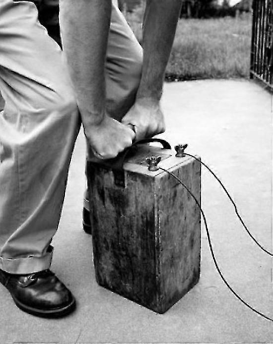 Low Section View Of A Man Detonating Explosives Poster