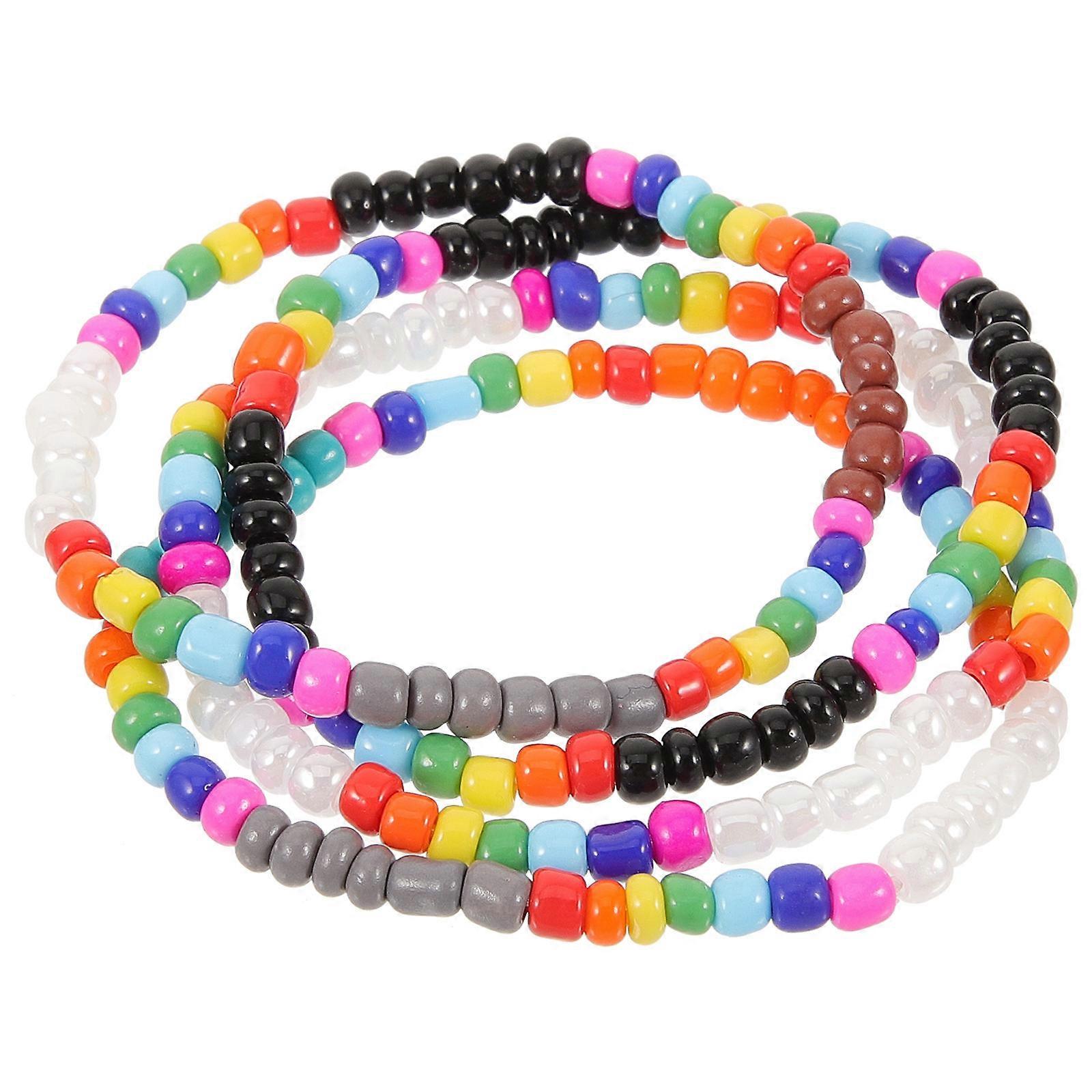 Here's a polished and engaging product description based on the details you provided:
**4pcs Colorful Beaded Bracelets – Handmade Bohemian Wrist