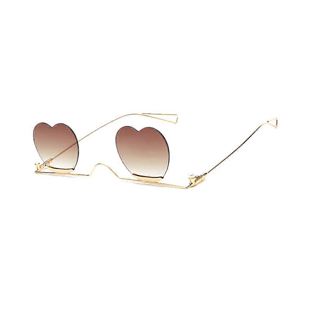 Here's a polished and professional product description based on the title you provided:
**Heart Shaped Sunglasses – Frameless Metal Retro Style