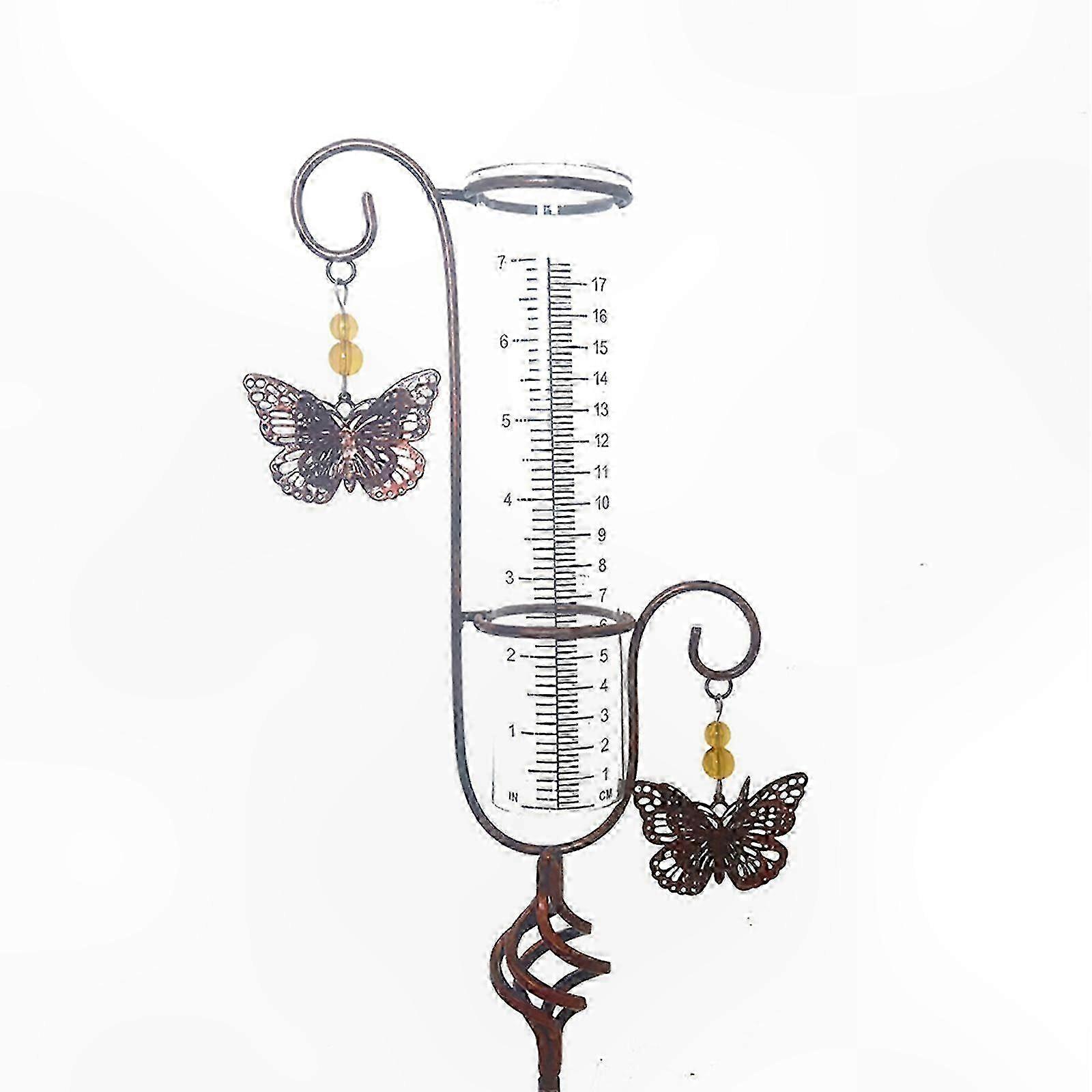 Utendørs værstasjon med regnmåler og termometer for hagebruk