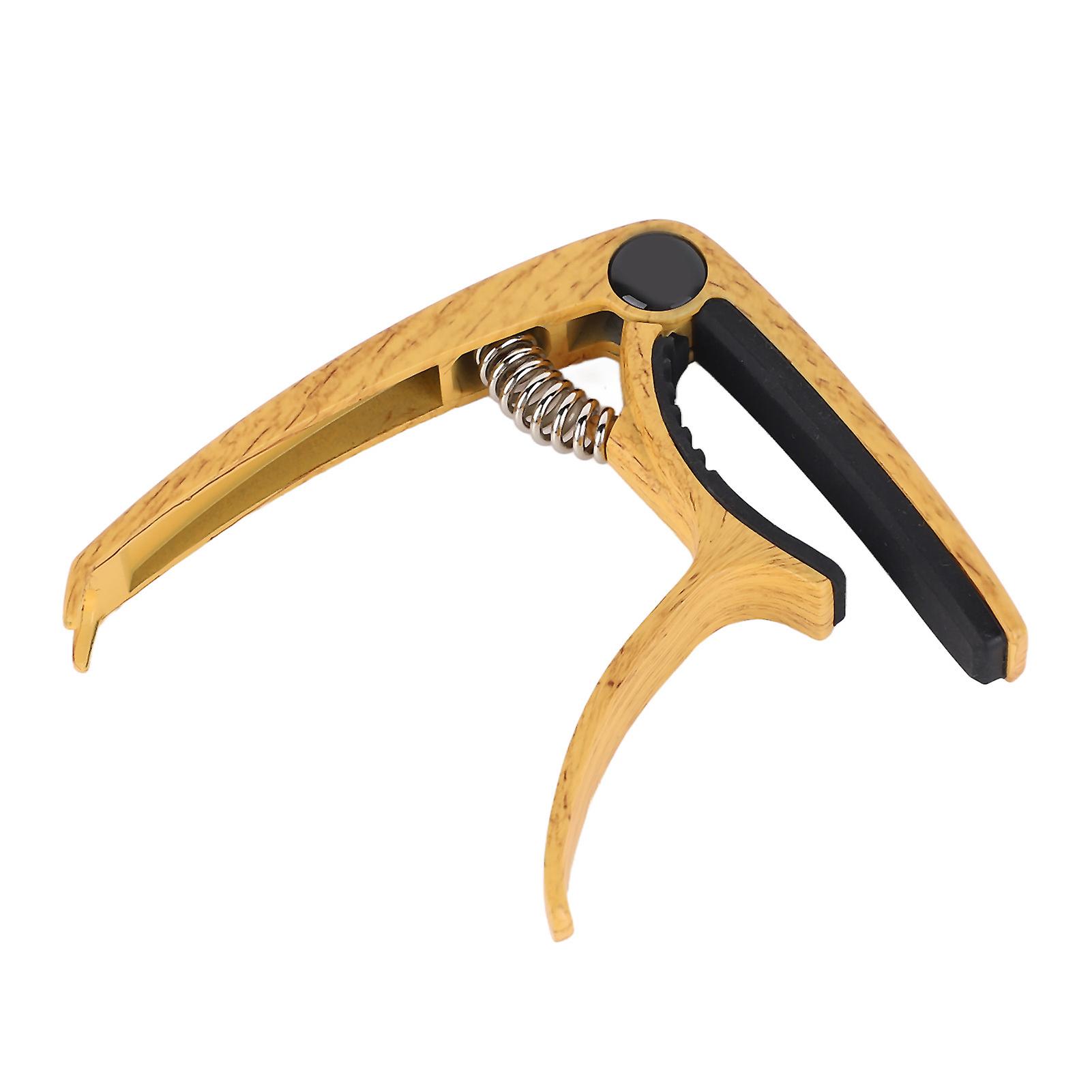 ギターカポメタルアコースティックエレクトリックウクレレベースイエローウッドグレイン用調整可能なスプリングテンションカポ