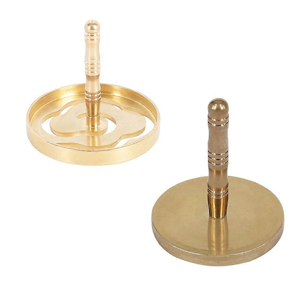 The **Copper Incense Press Tool With Removable Seal Ash Mold** is a traditional and elegant tool used for shaping incense from loose incense ash or .
