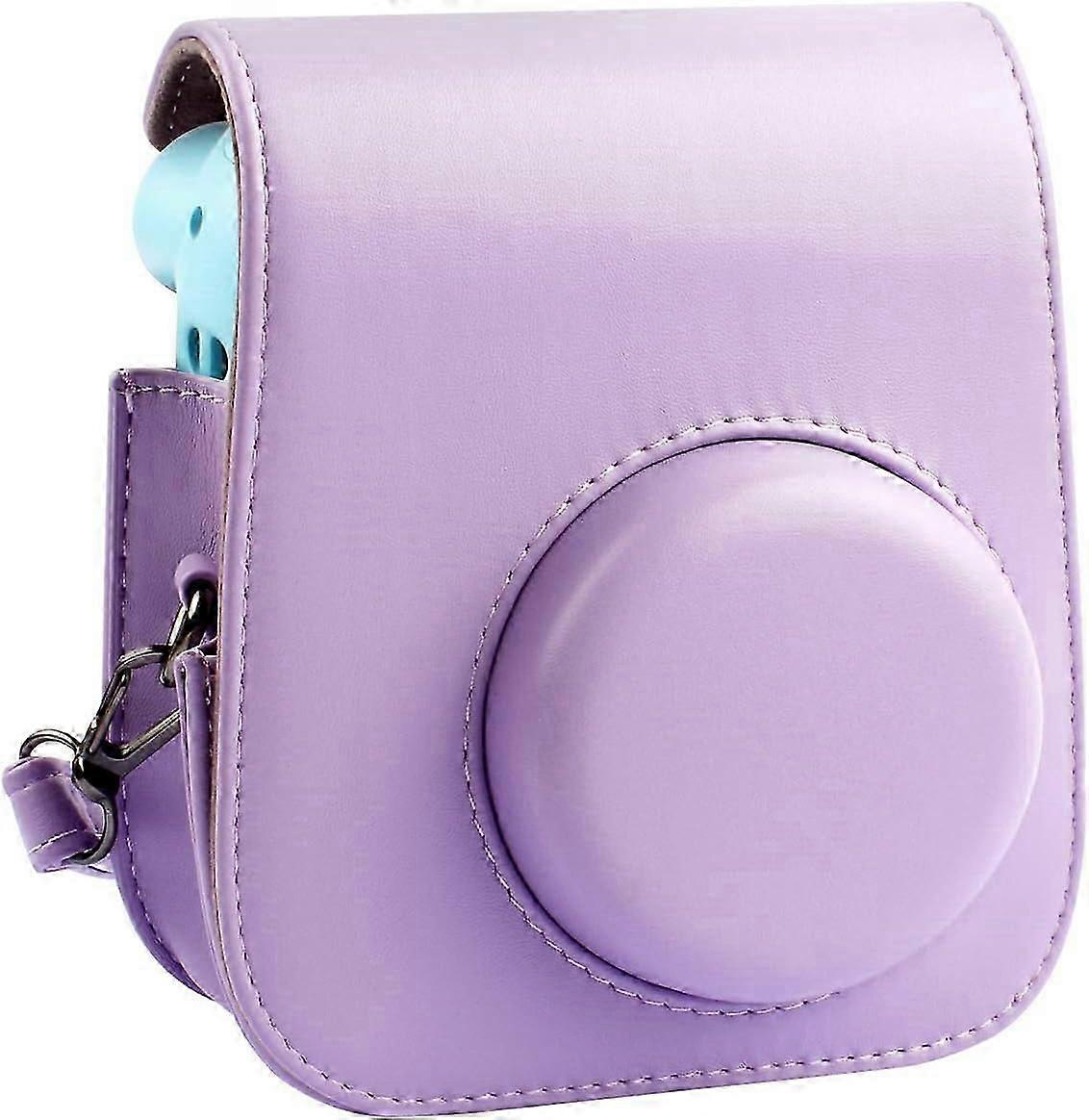 Camera bag for instant camera with adjustable strap and pocket