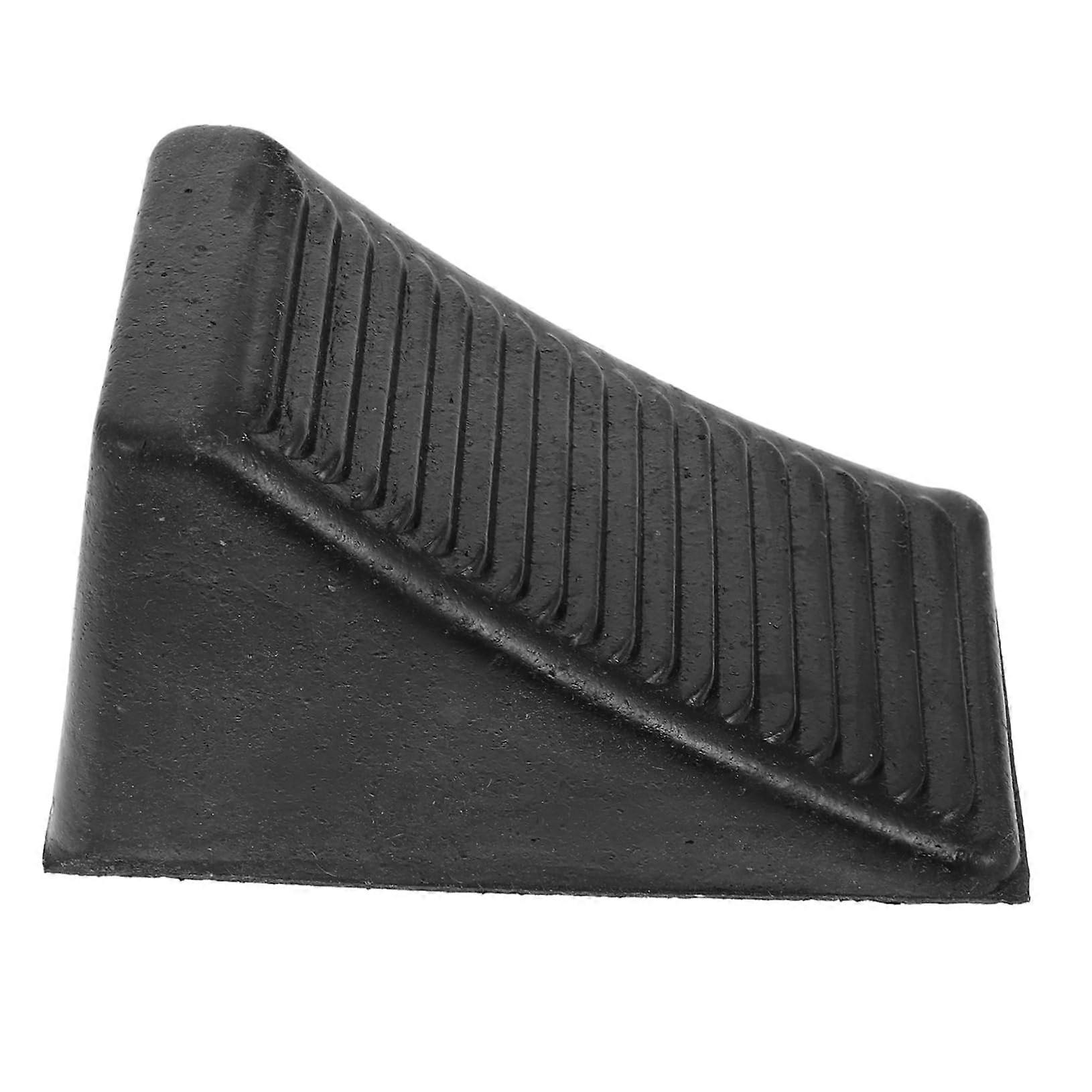 Sturdy wheel chock for vehicles, nonslip brake wedge for trailers, motorhomes, and trucks, stable and secure for slippery surfaces.