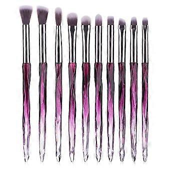 Lila Make-up-Pinsel mit weichen Borsten und Kristallgriff, geeignet für empfindliche Haut.